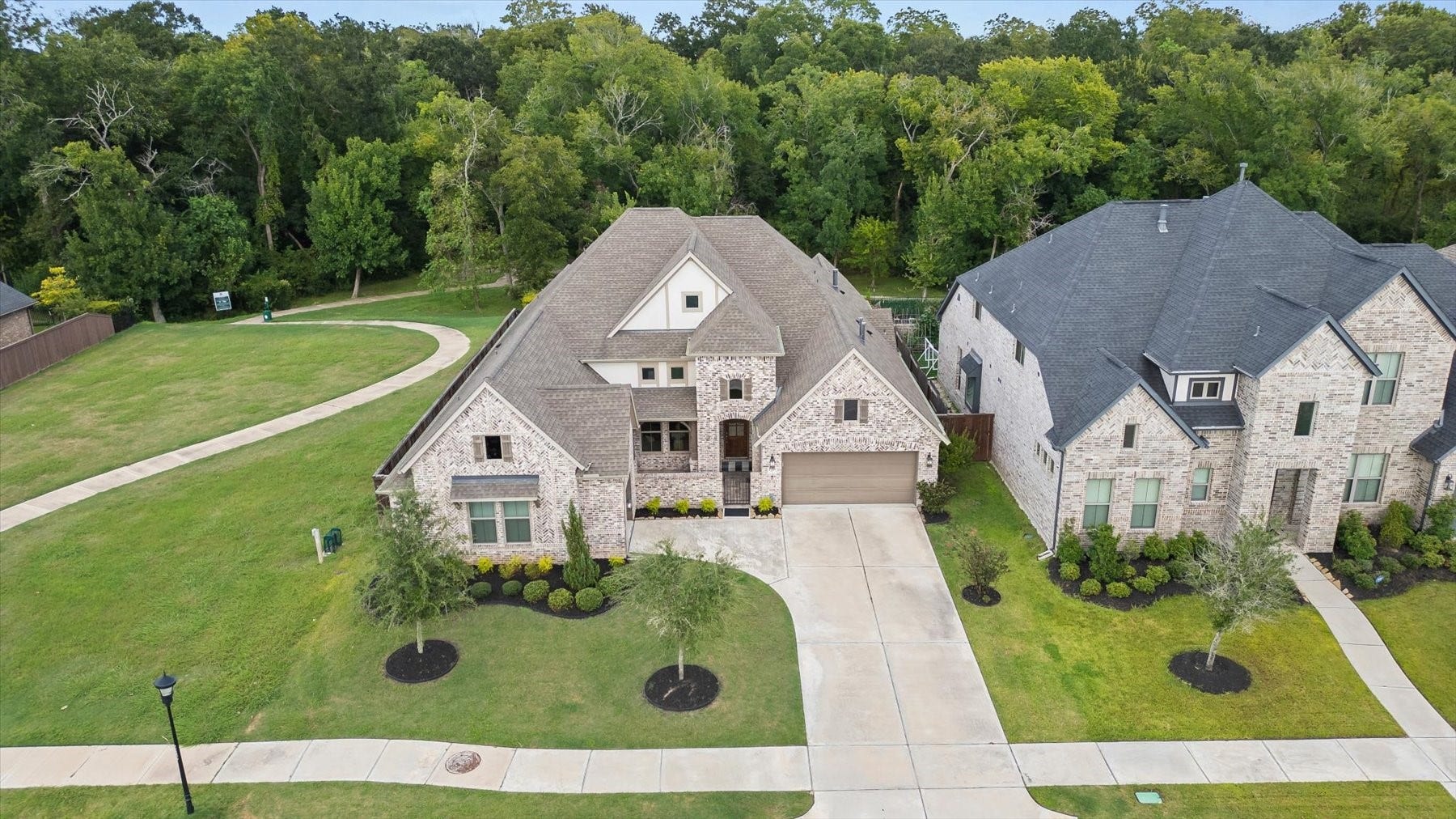 1219 Mcmurtry Ridge Drive, Katy, TX 77494 Private nature preserve setting with no rear neighbors, only one side neighbor, and direct access to the scenic walking trail.