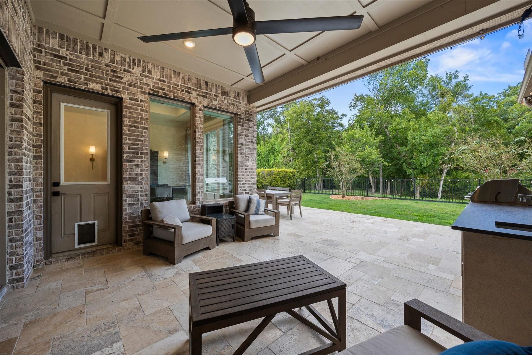 1219 Mcmurtry Ridge Drive, Katy, TX 77494 Relax and unwind under the covered back patio overlooking your private backyard.