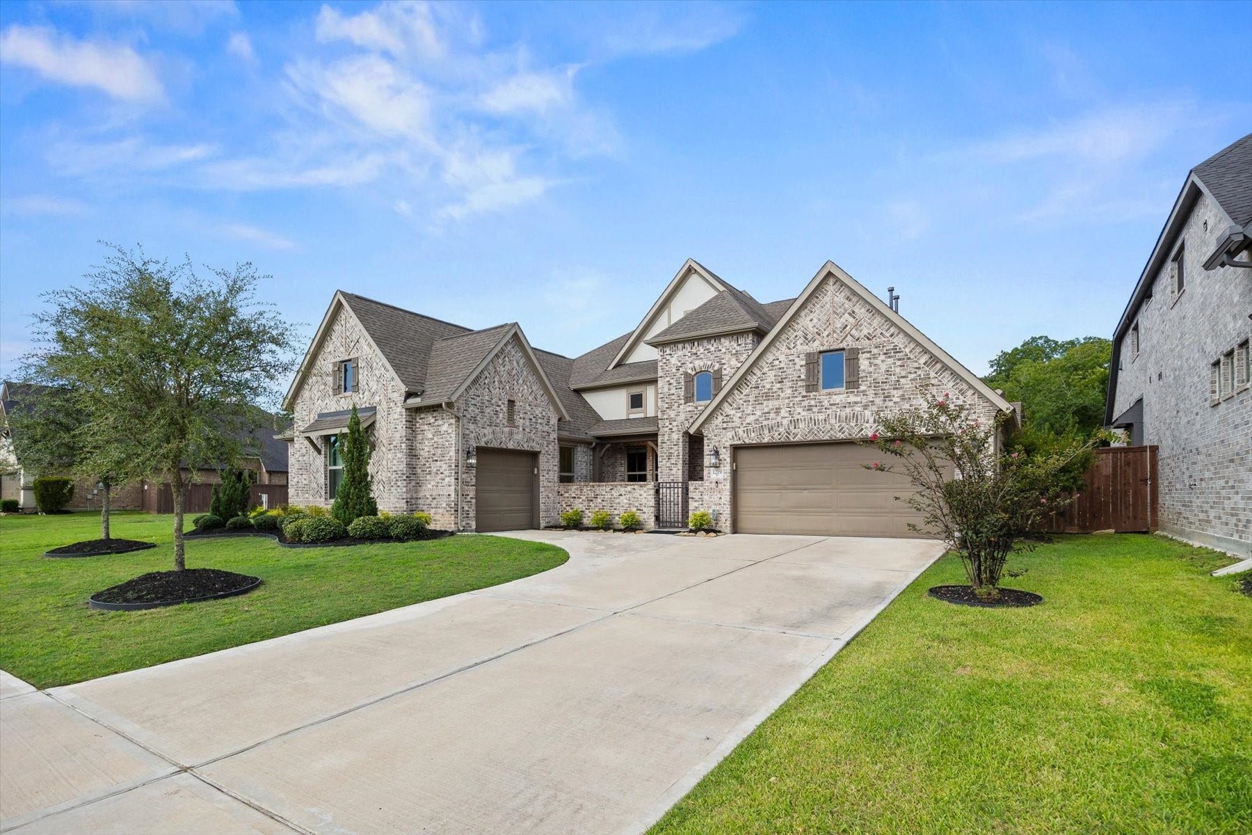 1219 Mcmurtry Ridge Drive, Katy, TX 77494 Gorgeous curb appeal and well maintained yard.