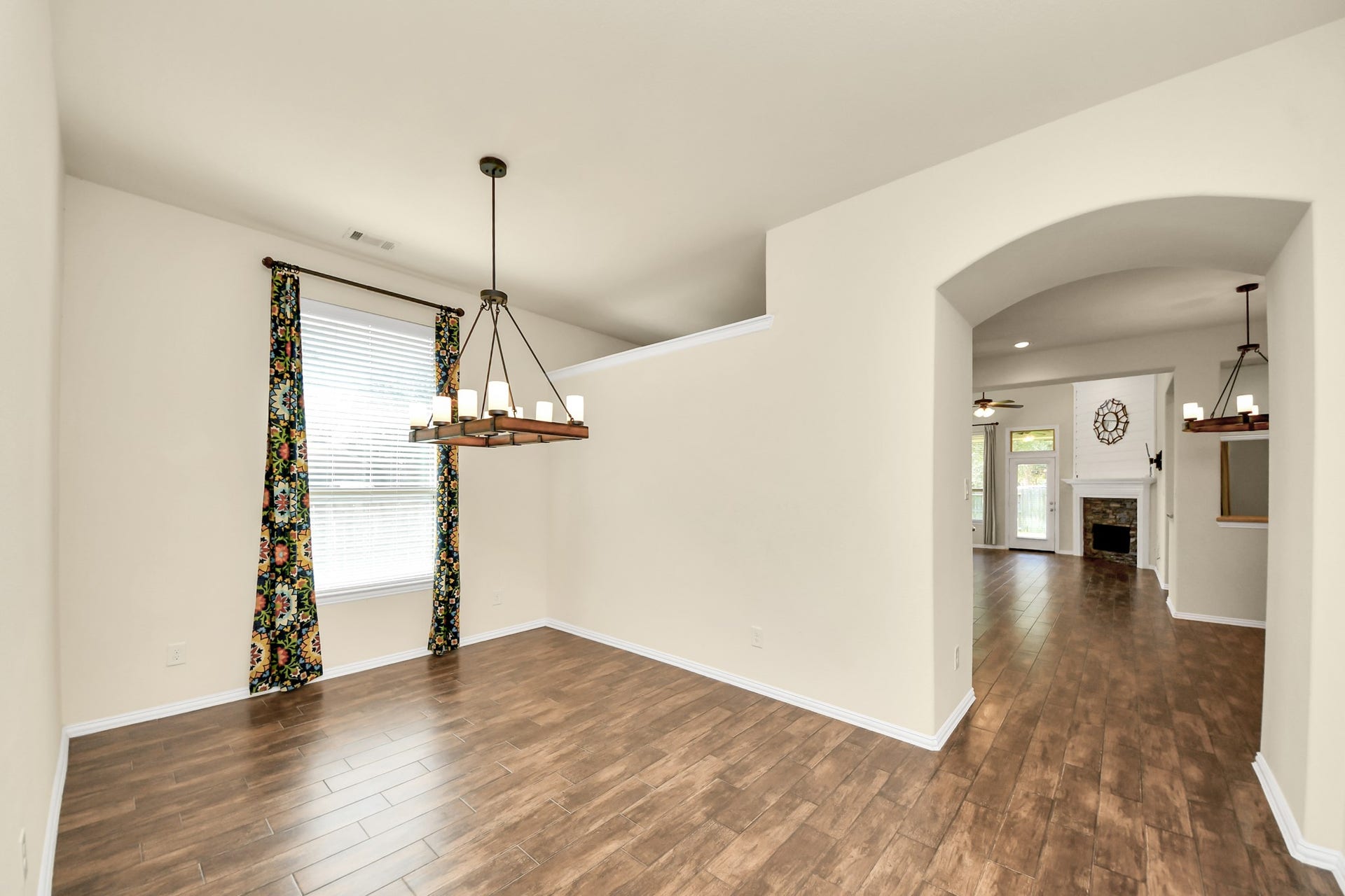 6003 Hedgepark Drive, Richmond, TX 77407 Photos include both previously furnished rooms and the homes current vacant condition to help buyers visualize the space and layout.