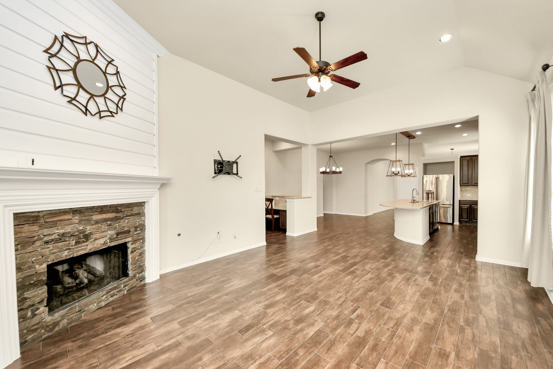 6003 Hedgepark Drive, Richmond, TX 77407 Photos include both previously furnished rooms and the homes current vacant condition to help buyers visualize the space and layout.