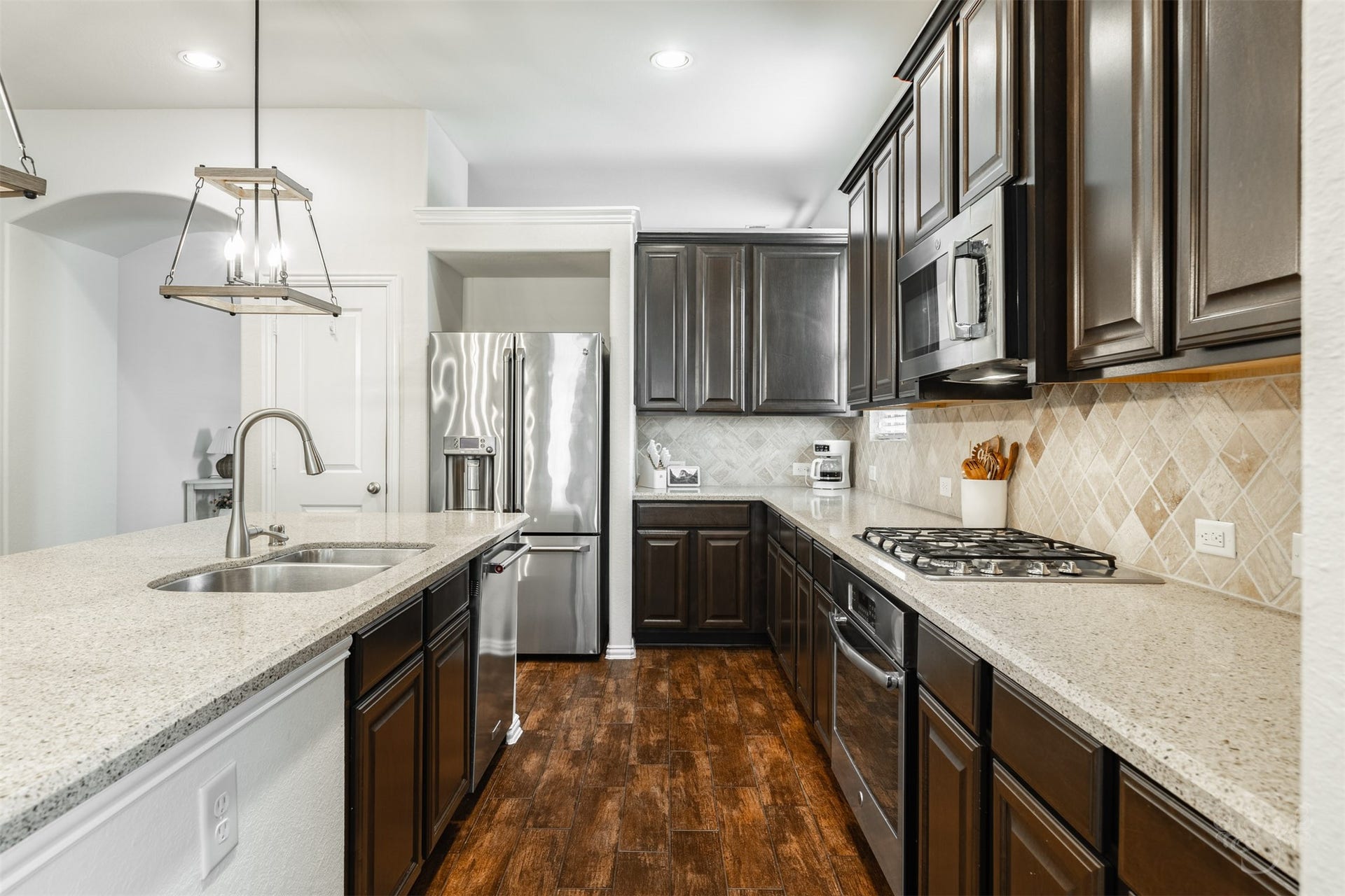 6003 Hedgepark Drive, Richmond, TX 77407 Photos include both previously furnished rooms and the homes current vacant condition to help buyers visualize the space and layout.