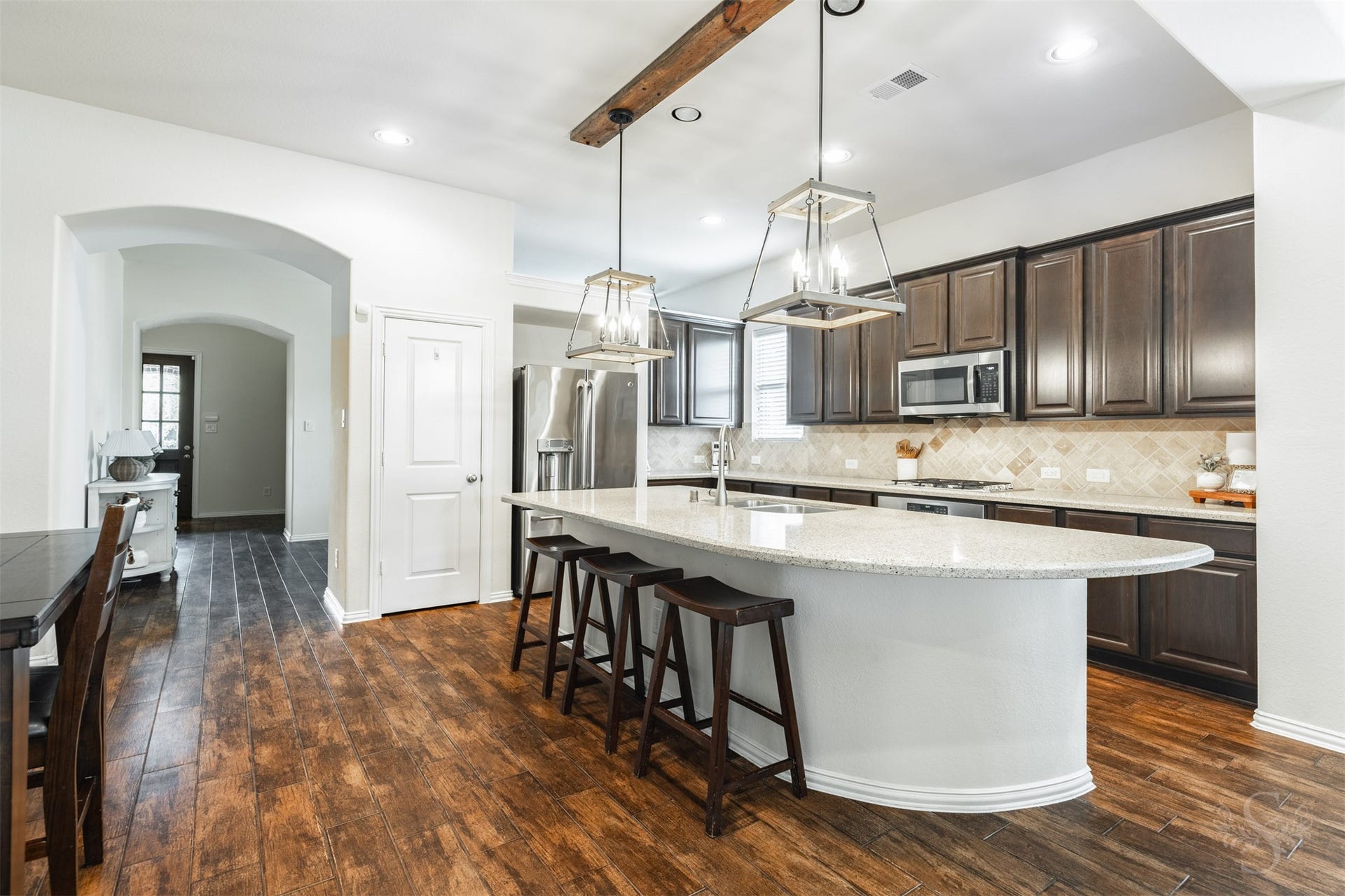 6003 Hedgepark Drive, Richmond, TX 77407 Photos include both previously furnished rooms and the homes current vacant condition to help buyers visualize the space and layout.