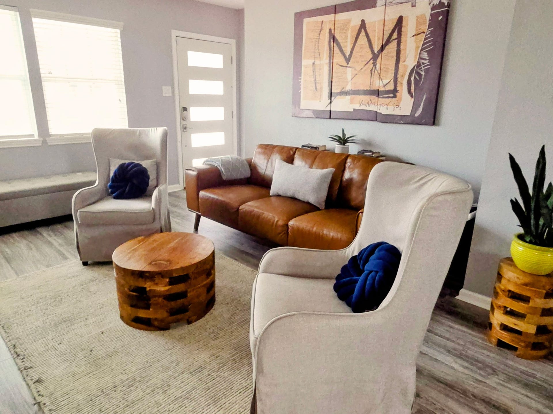 Beautifully furnished and light filled family room.