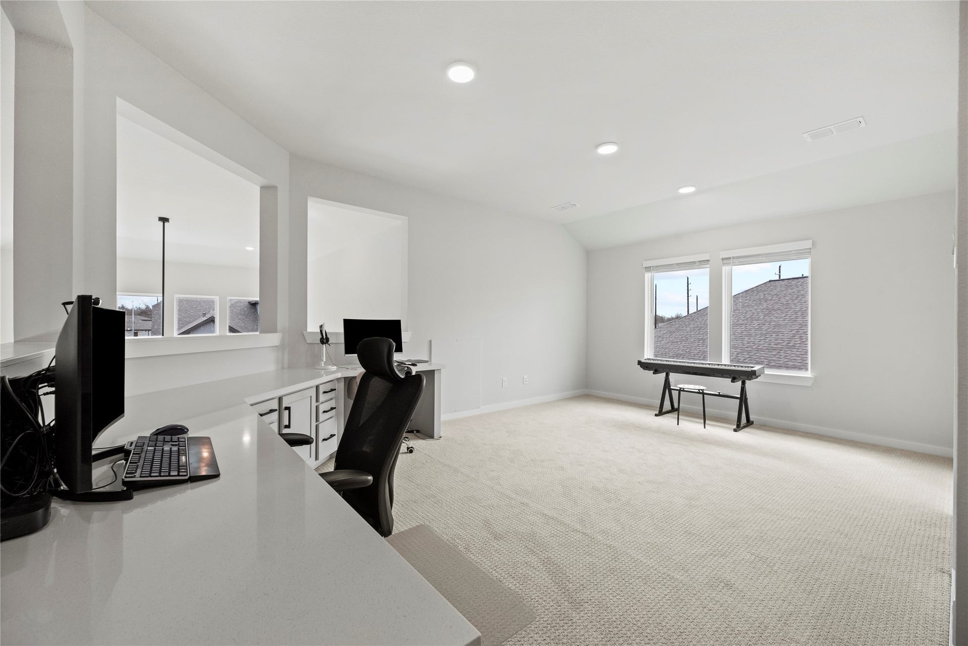 The whole family will love the expansive game room overlooking your living space below. This is a versatile space perfect for family fun or movie nights.