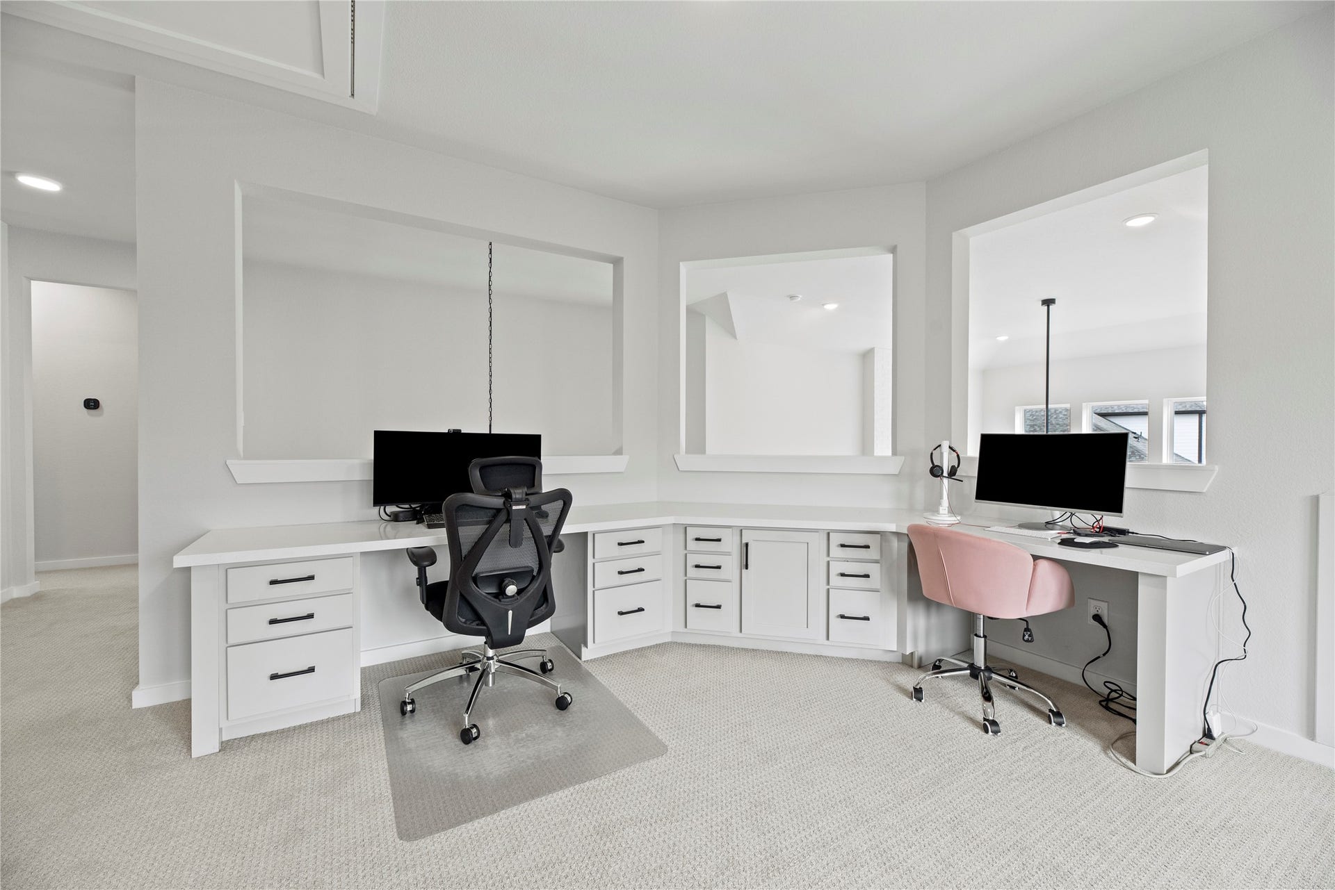 The built-in home office nook is thoughtfully designed, providing the perfect space for studying, remote work, or staying organized with ease and efficiency.