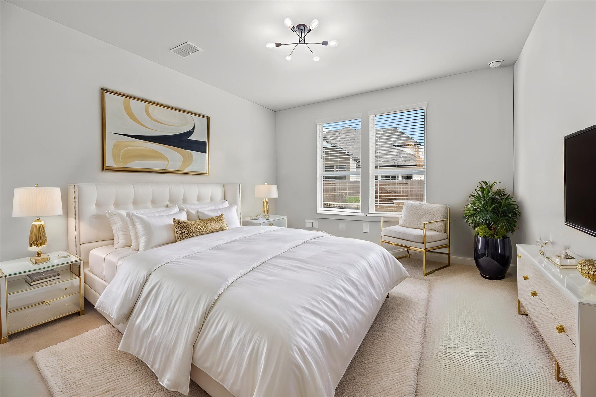 The primary bedroom offers a comfortable and private retreat, featuring large windows and convenient direct access to its en-suite bath. Virtually staged so you can imagine the possibilities.