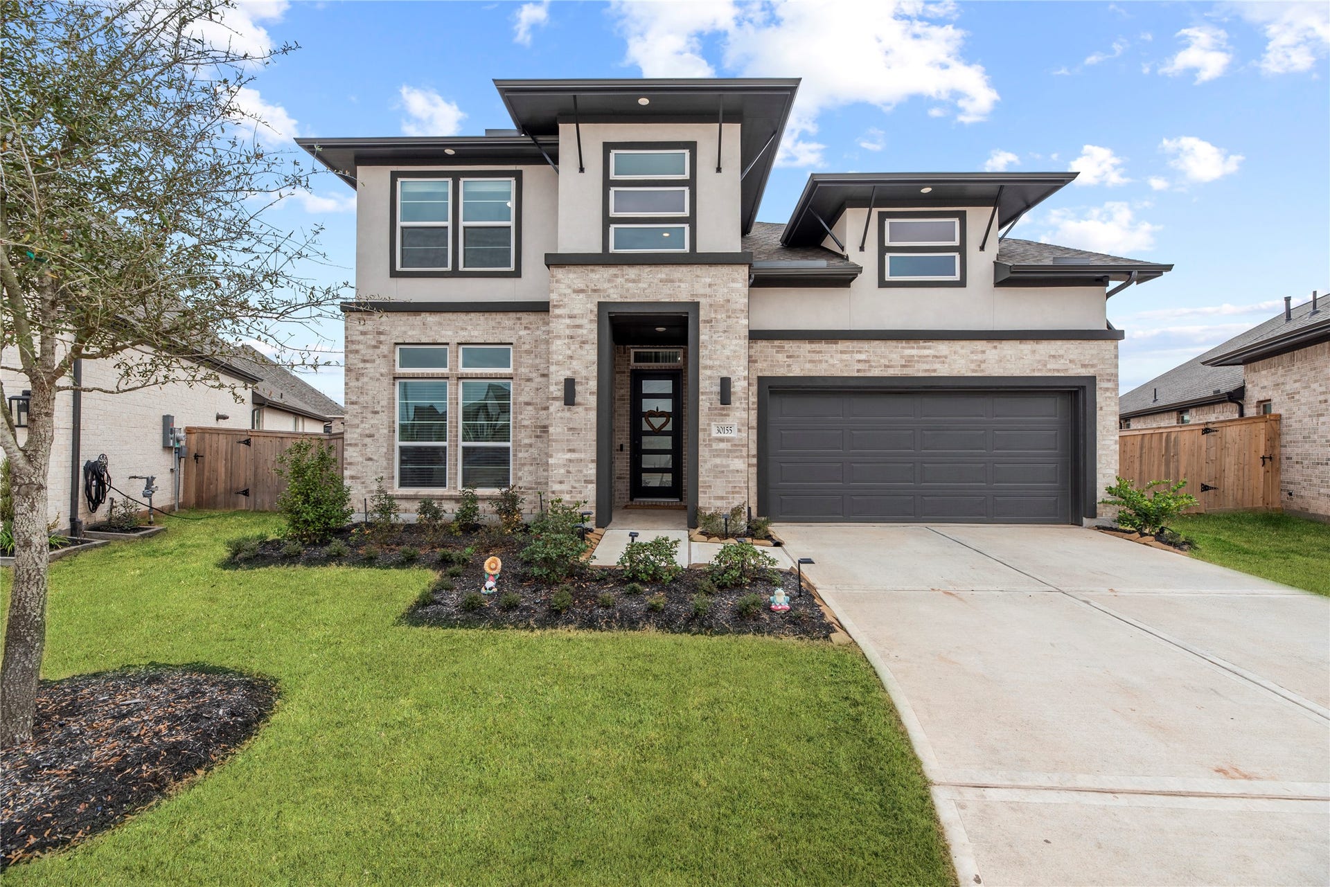 Welcome home to 30155 Gold Finch Place, nestled in the prestigious Fullbrook on Fulshear Creek community! This stunning residence offers an exceptional blend of elegance, comfort, and modern charm in one of the area's most sought-after neighborhoods.