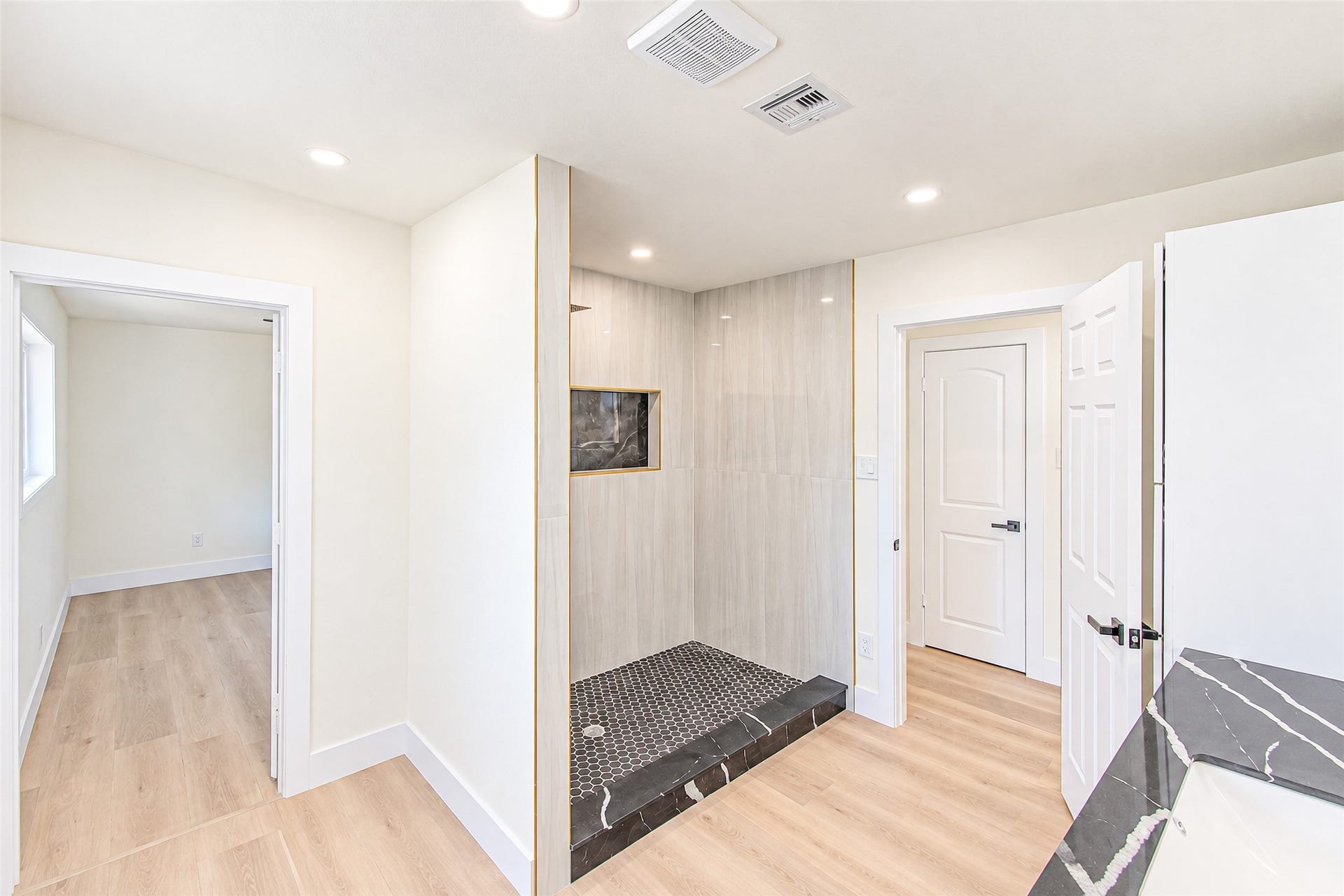 Experience seamless living with a stylish Jack and Jill bathroom, perfectly connecting two inviting rooms for ultimate convenience.