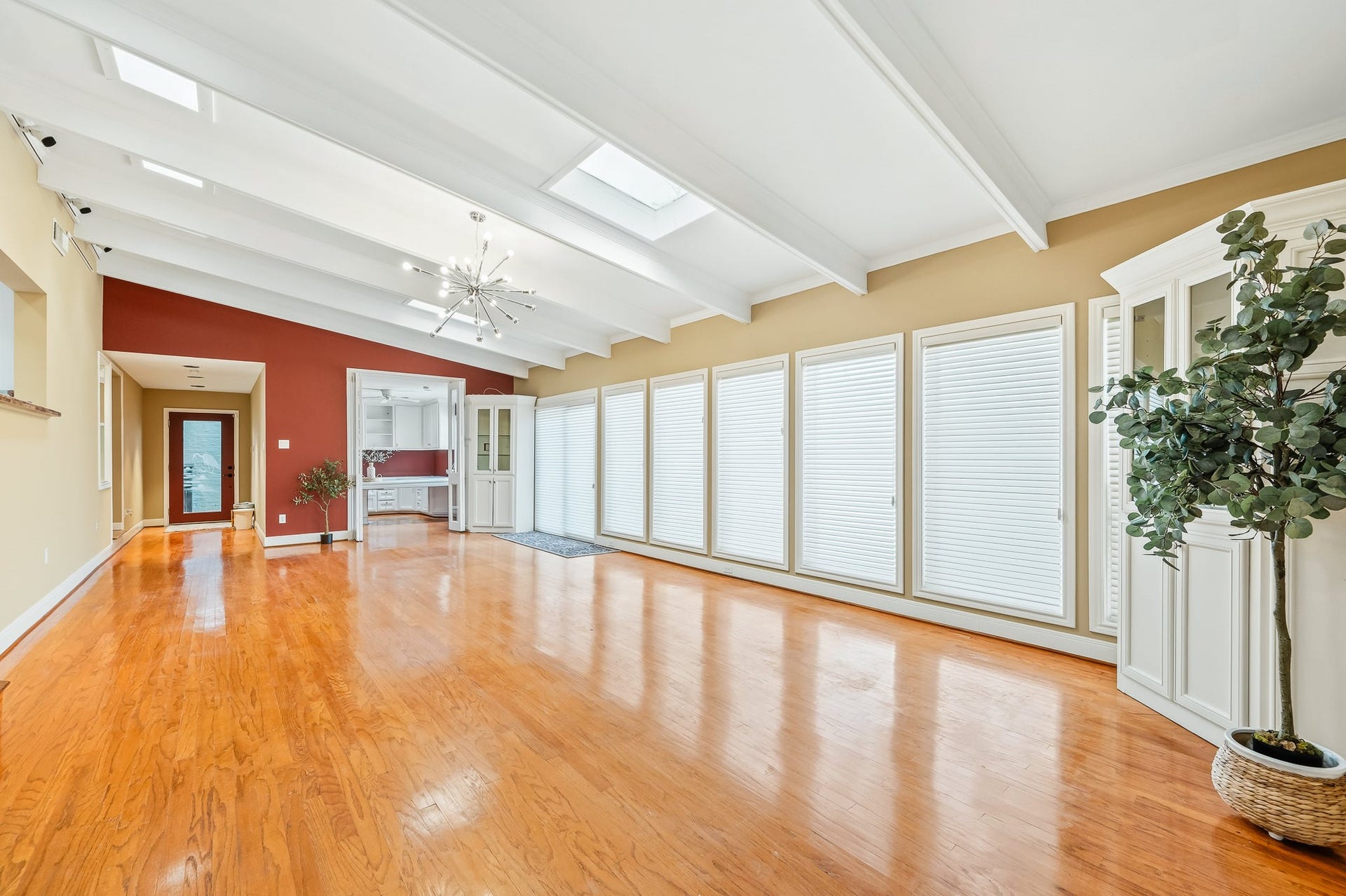 2111 N Galveston Avenue, Pearland, TX 77581 A custom home office with a view directly into the family room, perfect for staying connected while working.