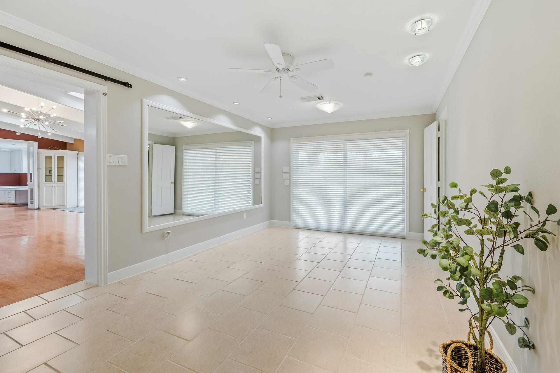 2111 N Galveston Avenue, Pearland, TX 77581 Beautiful secondary primary suite offering complete privacy on the opposite side of the home. Includes doors leading to the backyard, a full bath, and a relaxing steam saunaideal for a mother-in-law or guest suite.