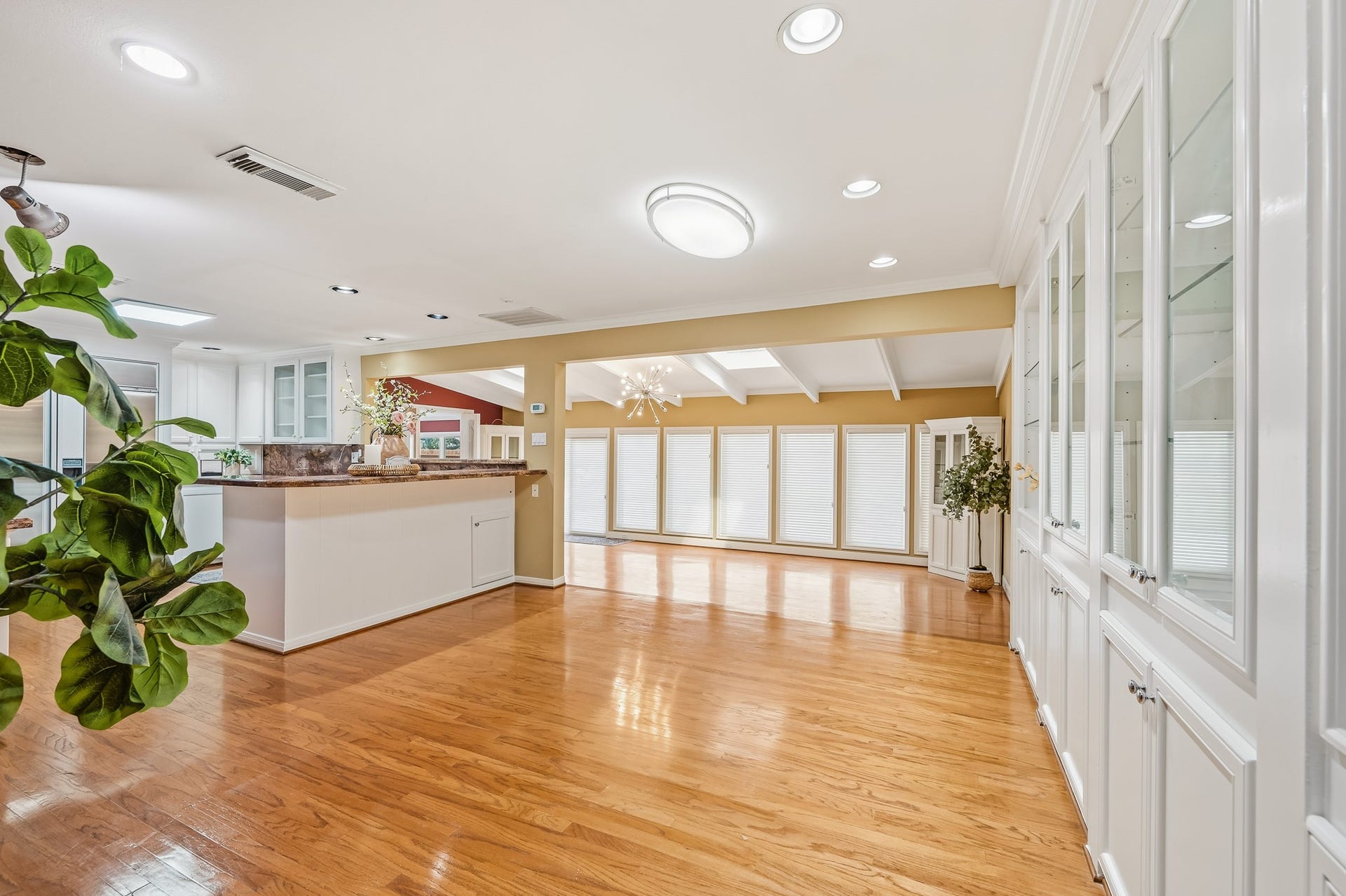 2111 N Galveston Avenue, Pearland, TX 77581 Behind the built-in china cabinets, a spacious butlers pantry offers extra counter space and plenty of storage, making the kitchen both functional and elegant.
