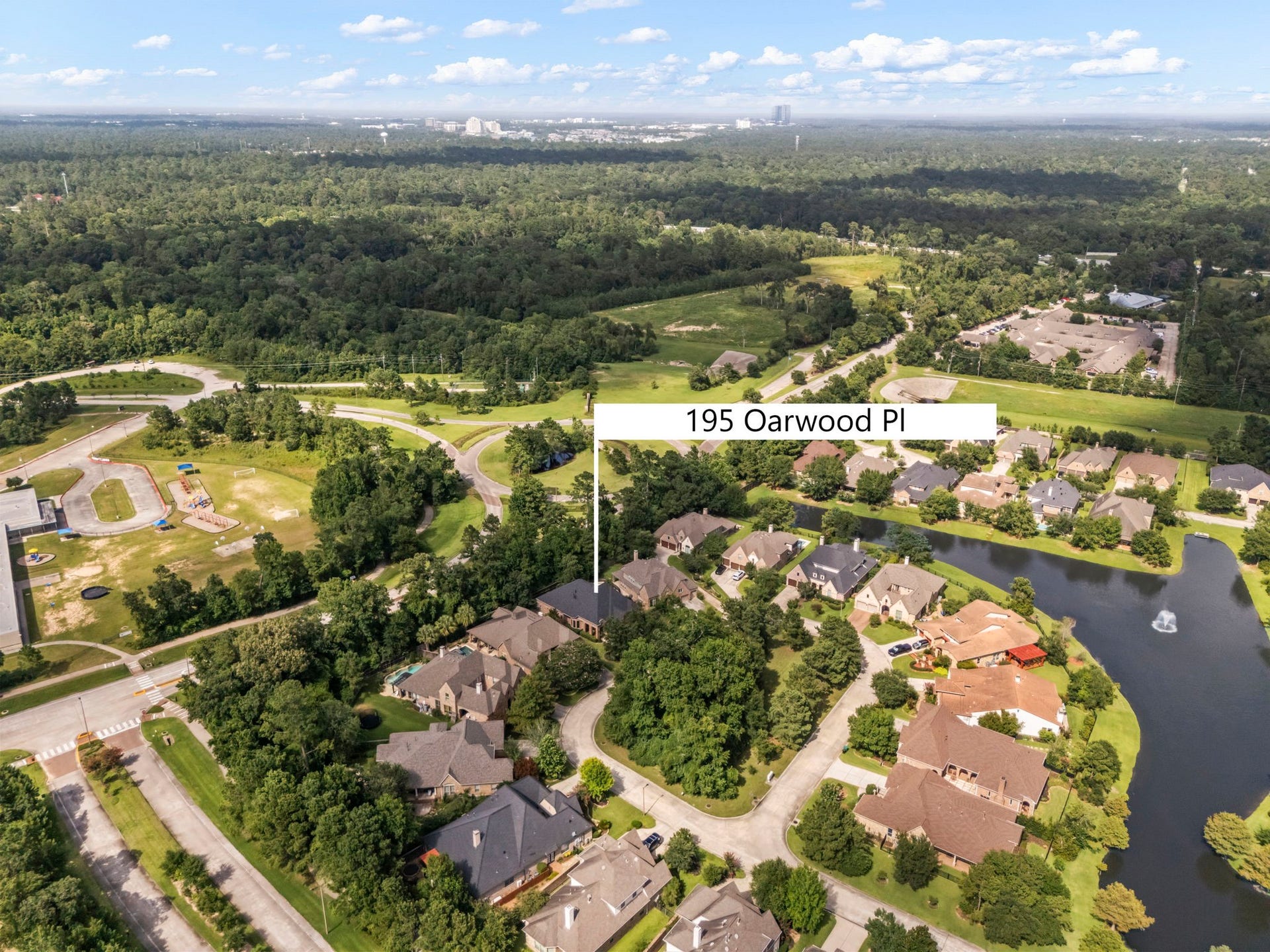 195 Oarwood Place, The Woodlands, TX 77389 Perfectly positioned along a private, tree-lined cul-de-sac loop, the home sits just steps from a winding neighborhood canal that feeds directly into the scenic community lake. Bordered by a vast, protected greenbelt nature preserve, this outstanding lot combines absolute privacy with seamless access to adjacent neighborhood walking paths and local amenities