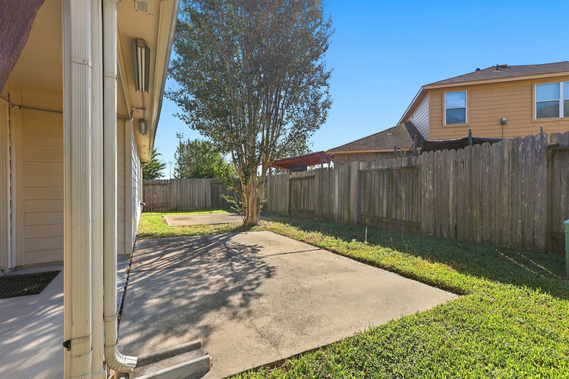 21207 Colton Cove Drive, Houston, TX 77095 Backyard with extended patio