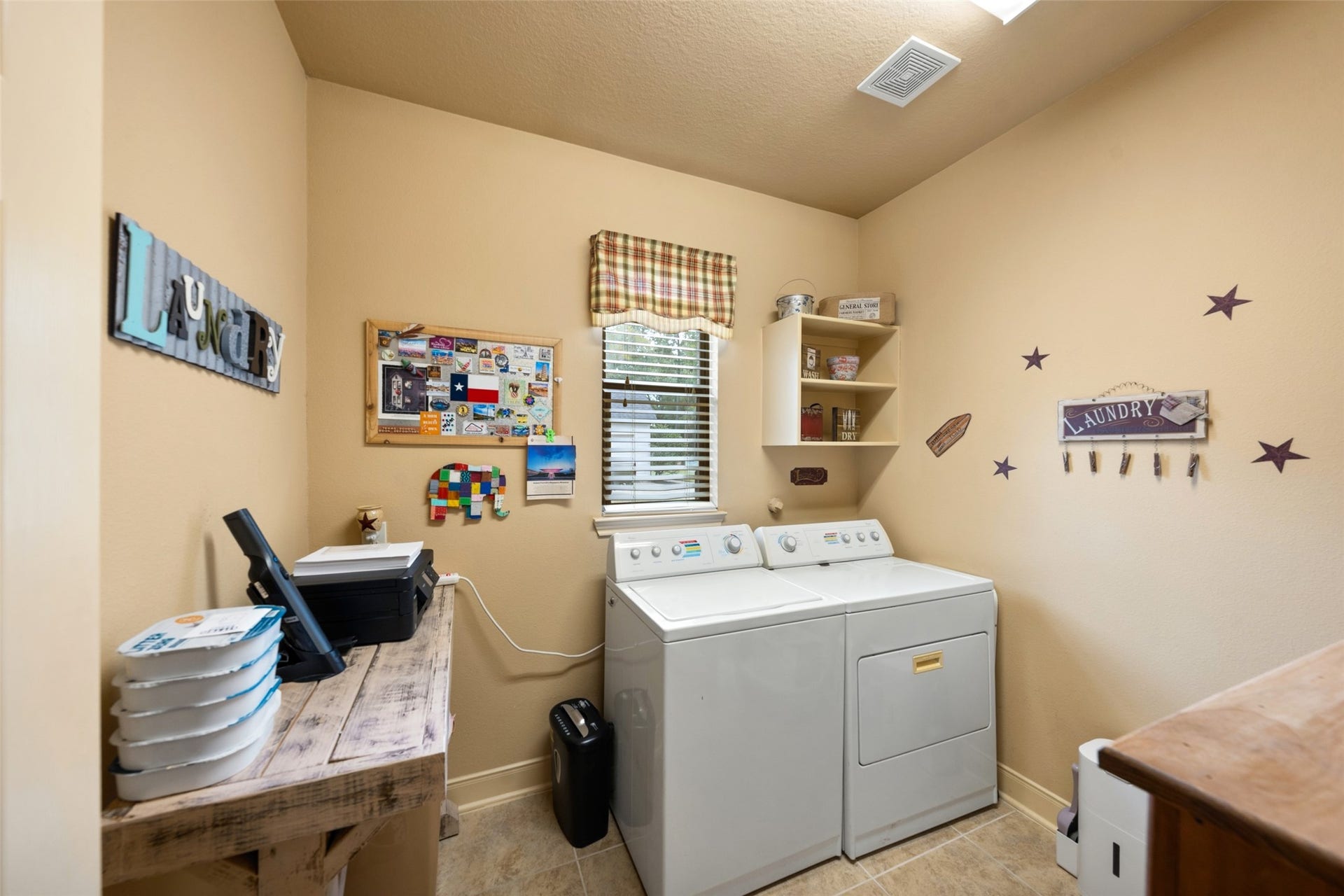 903 Weeping Willow Way, Magnolia, TX 77354 Spacious laundry room with built in shelves and room for folding table or storage