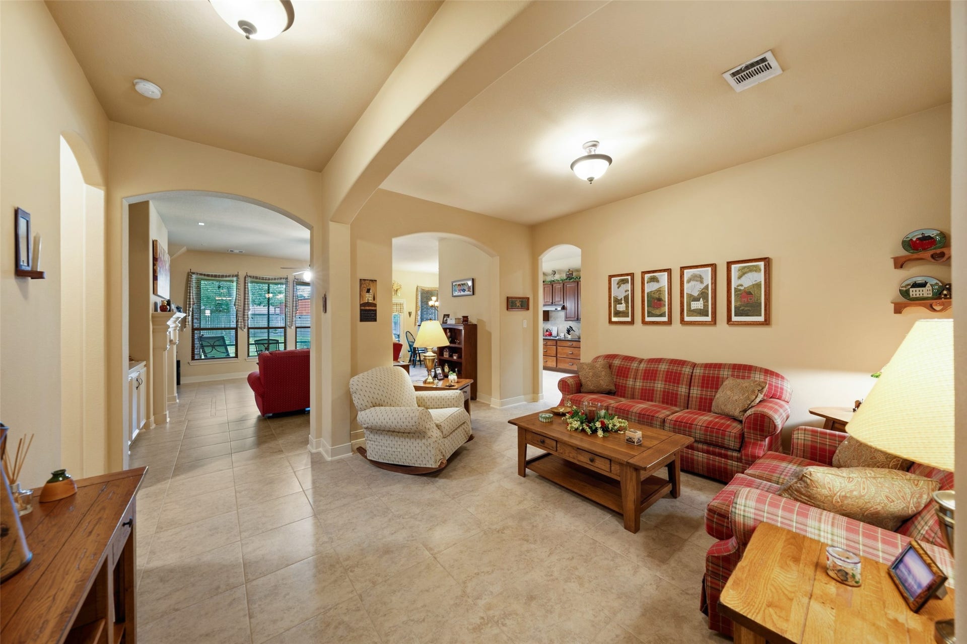 903 Weeping Willow Way, Magnolia, TX 77354 This is another view showing how floor plan flows into main living area. You'll love the tile floors for easy maintenance.