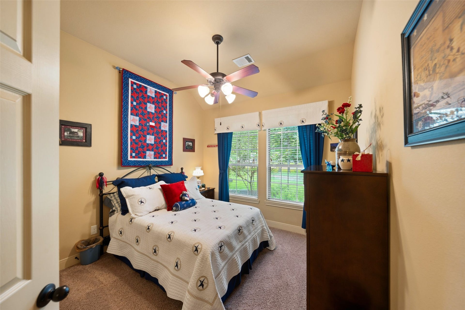 903 Weeping Willow Way, Magnolia, TX 77354 This is one of the 3 secondary bedrooms featuring a large window that provides the space with natural light. The only carpet in this home is in the secondary bedrooms.