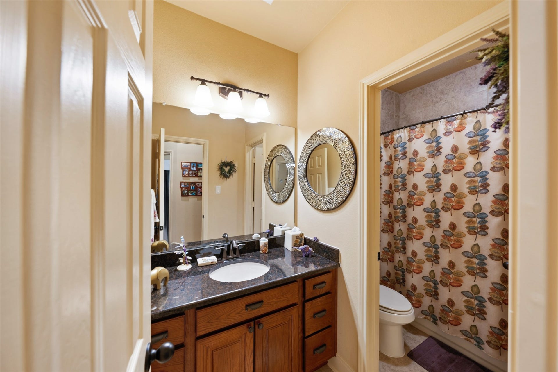 903 Weeping Willow Way, Magnolia, TX 77354 The secondary bath features vanity area separate from tub and toilet area to make it easy for people to share bath
