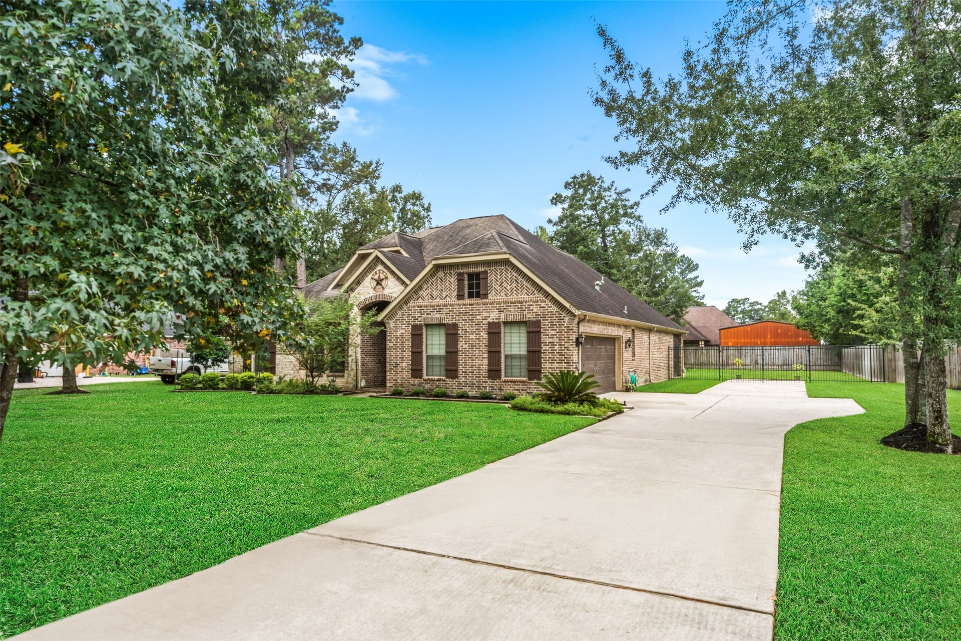 903 Weeping Willow Way, Magnolia, TX 77354 This meticulously maintained home with mature landscaping is located on a spacious 1/2 acre lot featuring an extended driveway for easy addition of shop and mature trees for added privacy and curb appeal.