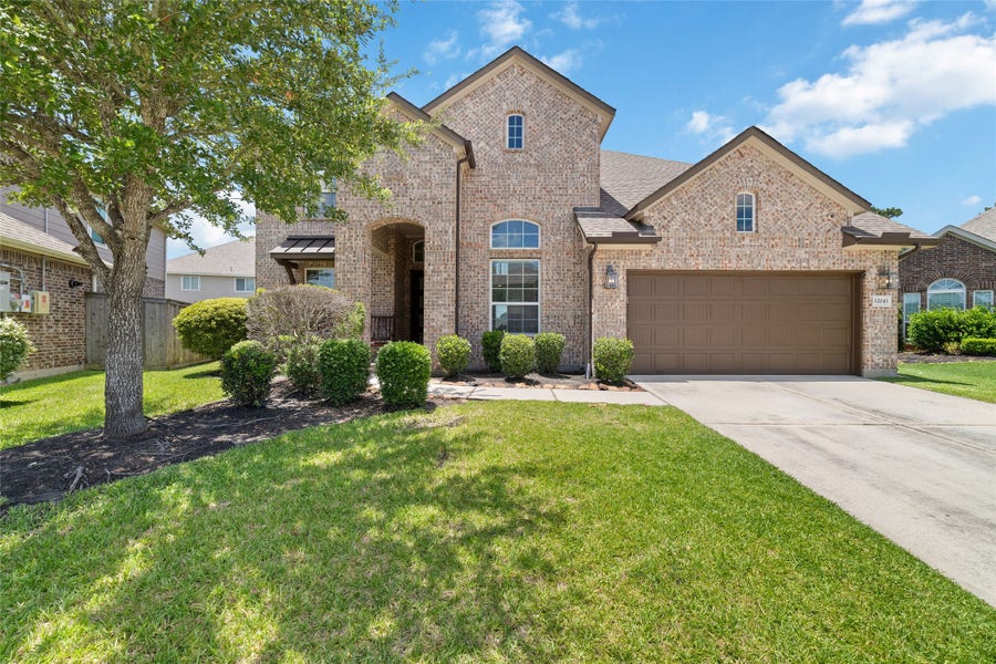 Property photo for 12043 Tree Top Hills Lane, Tomball, TX