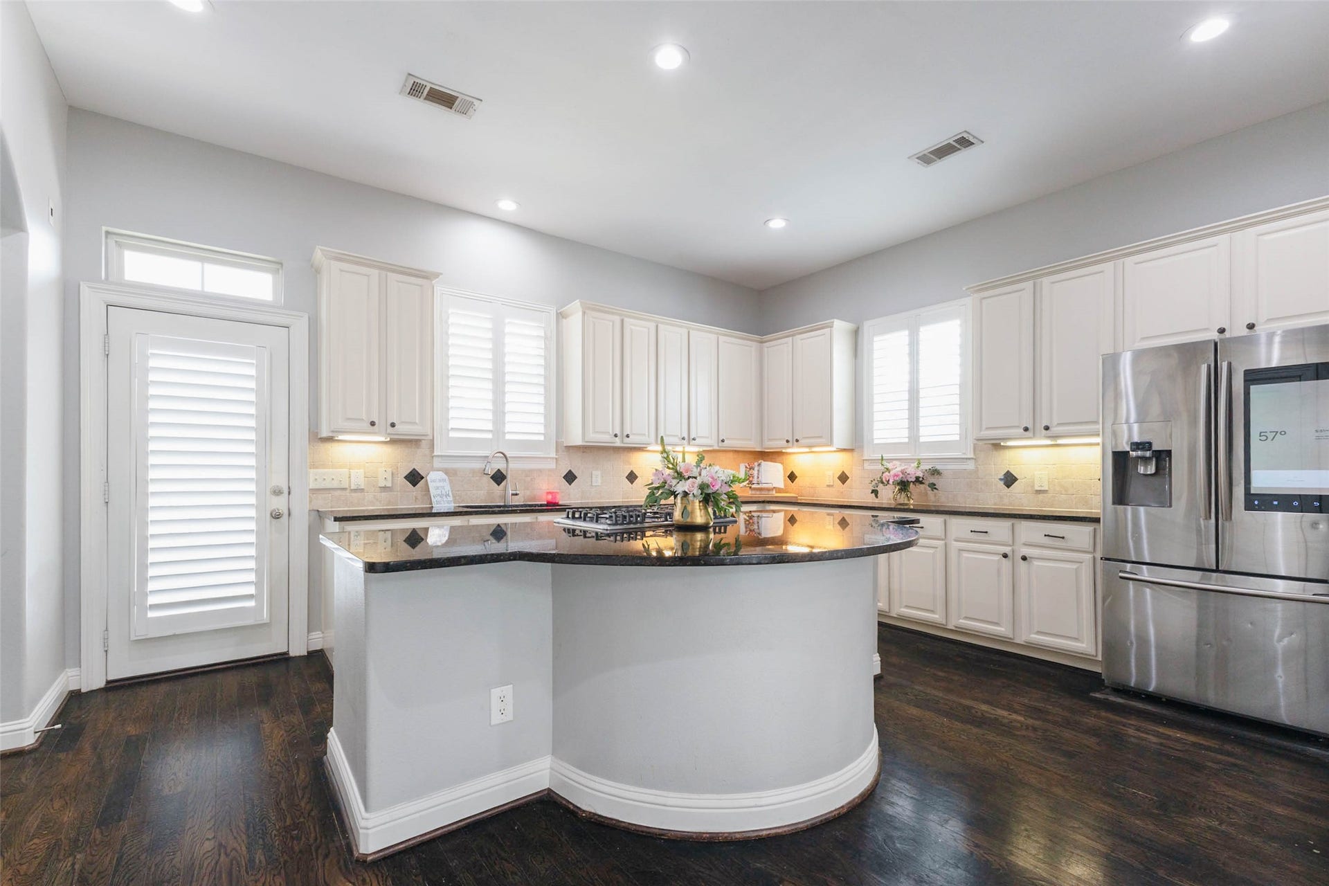 Gather around this massive island with the people you adore most! If you love to entertain, you'll love living here!