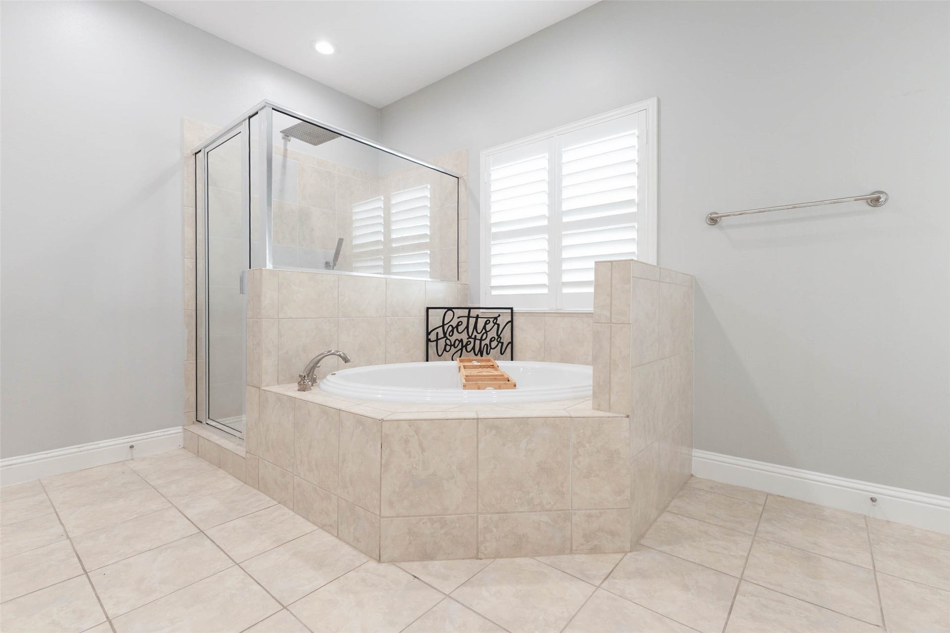 Wash or soak your worries away in this large primary bathroom!