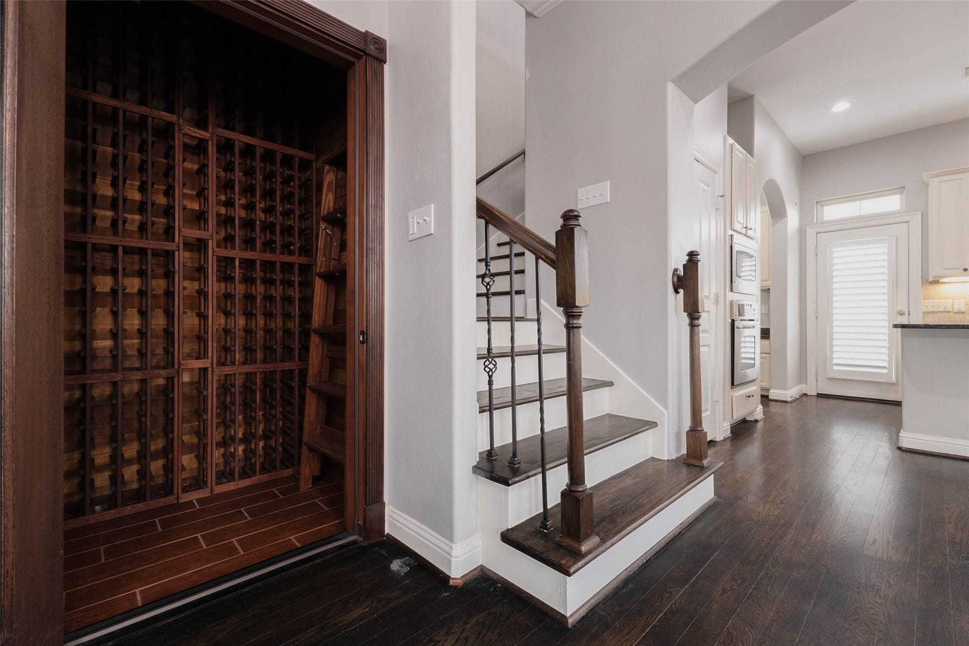 Talk about ELEVATING a space!! This floor to ceiling wine cellar turn everyone's head who comes to visit!