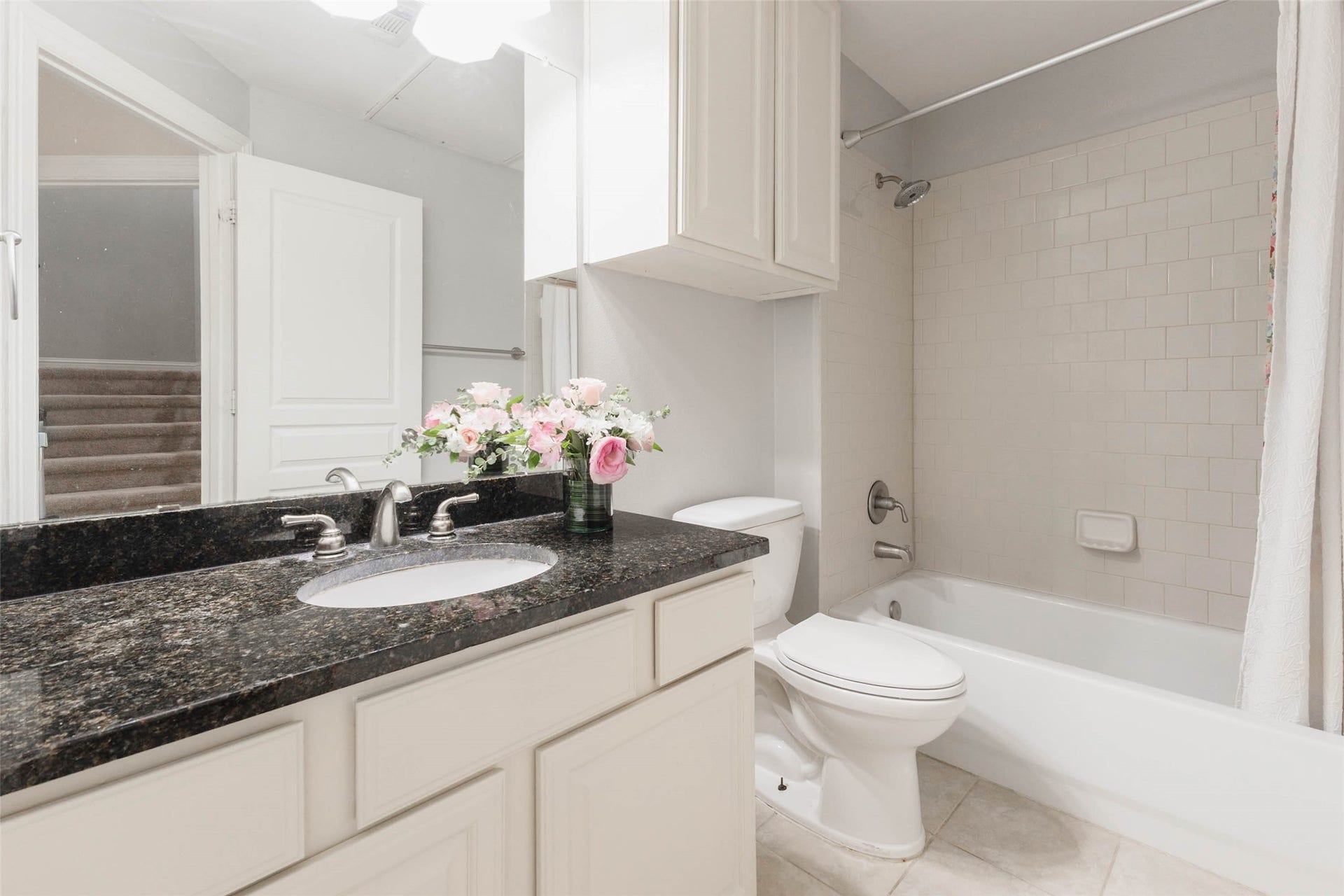 First full bathroom on the first floor off of the game room and bedroom.
