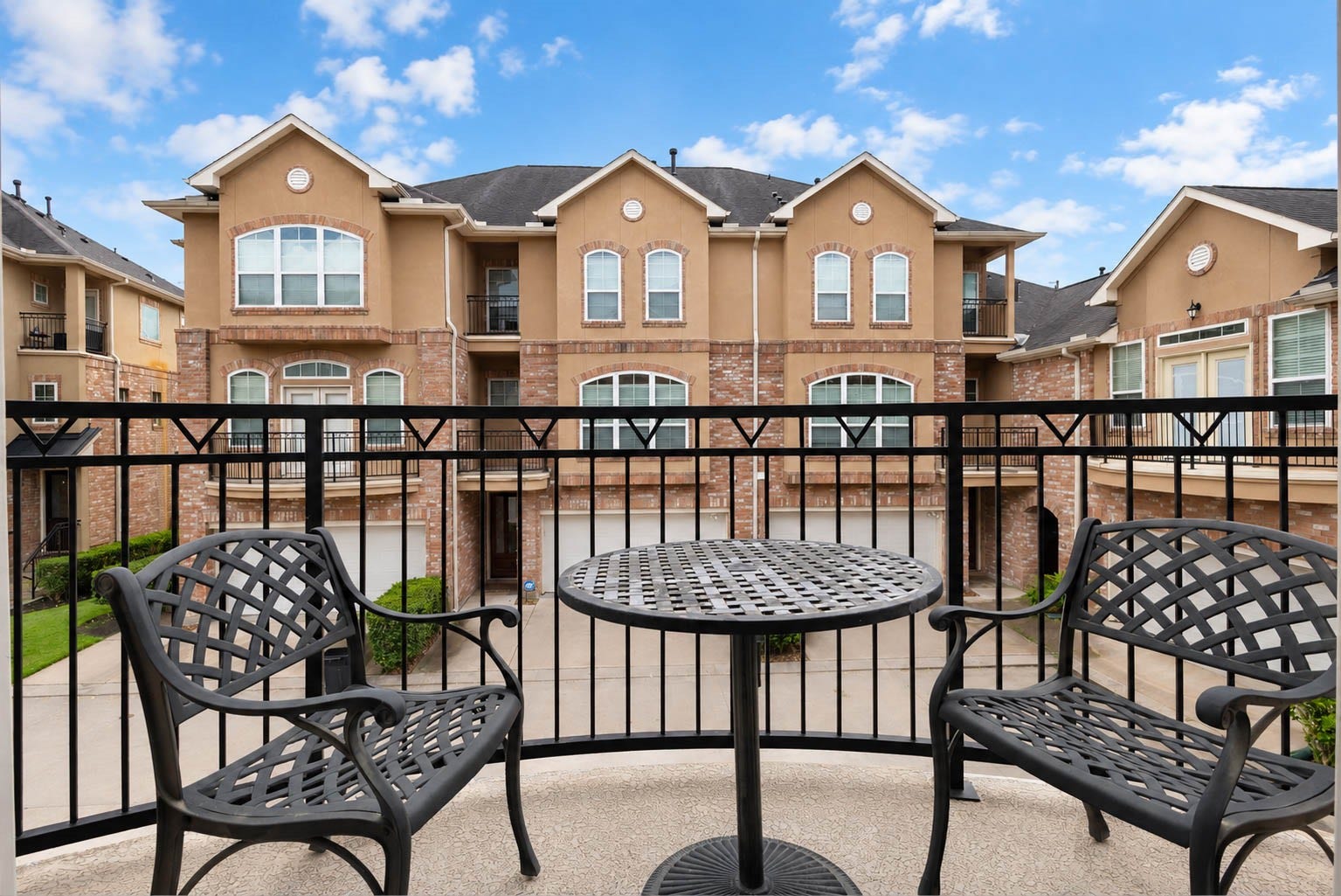 Step out on a cool morning and sip your coffee on this balcony located off of the living room.