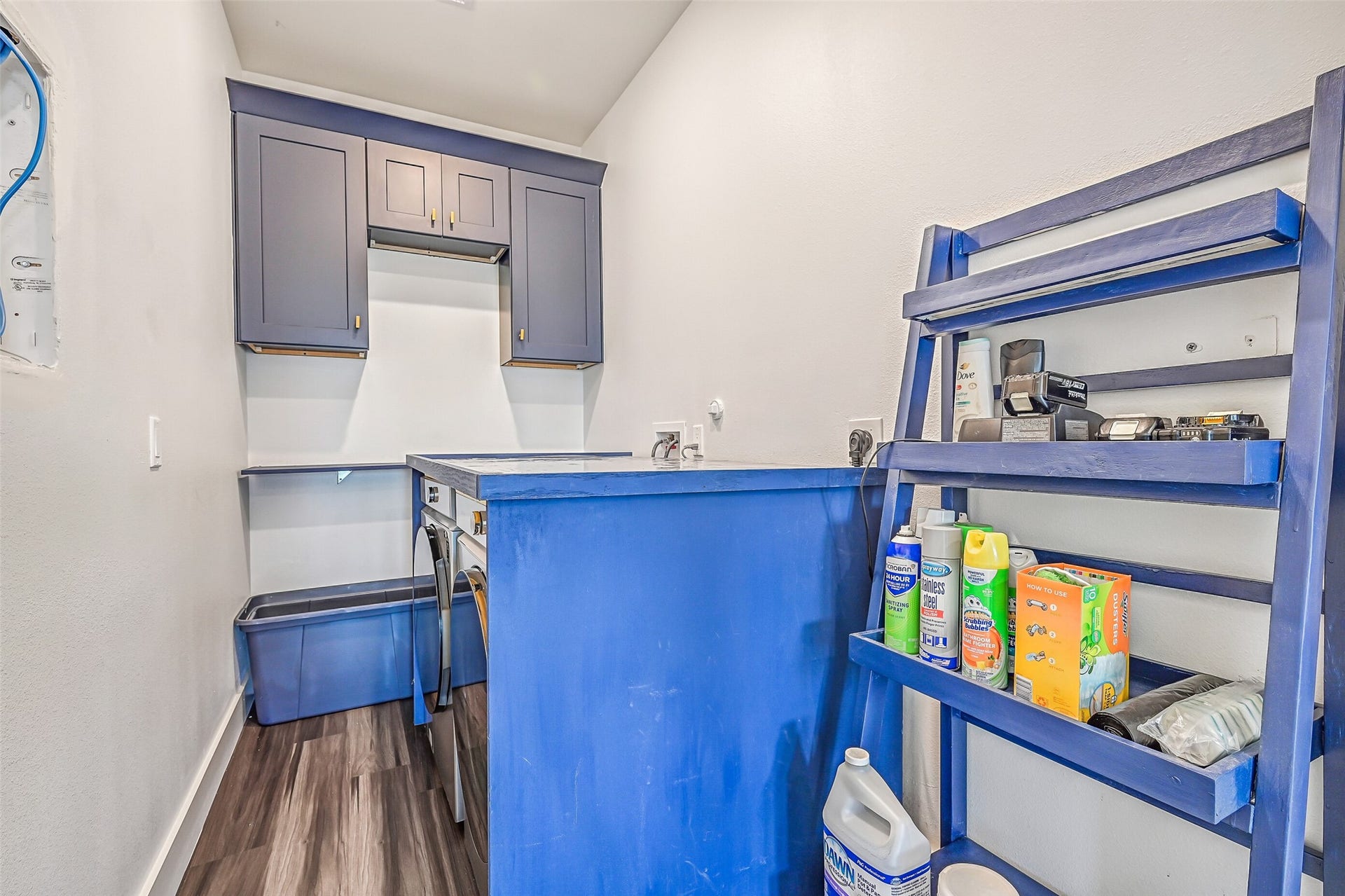 3627 Niko Court, Galveston, TX 77554 The laundry room is thoughtfully situated between the two bedrooms, offering easy access and added convenience.