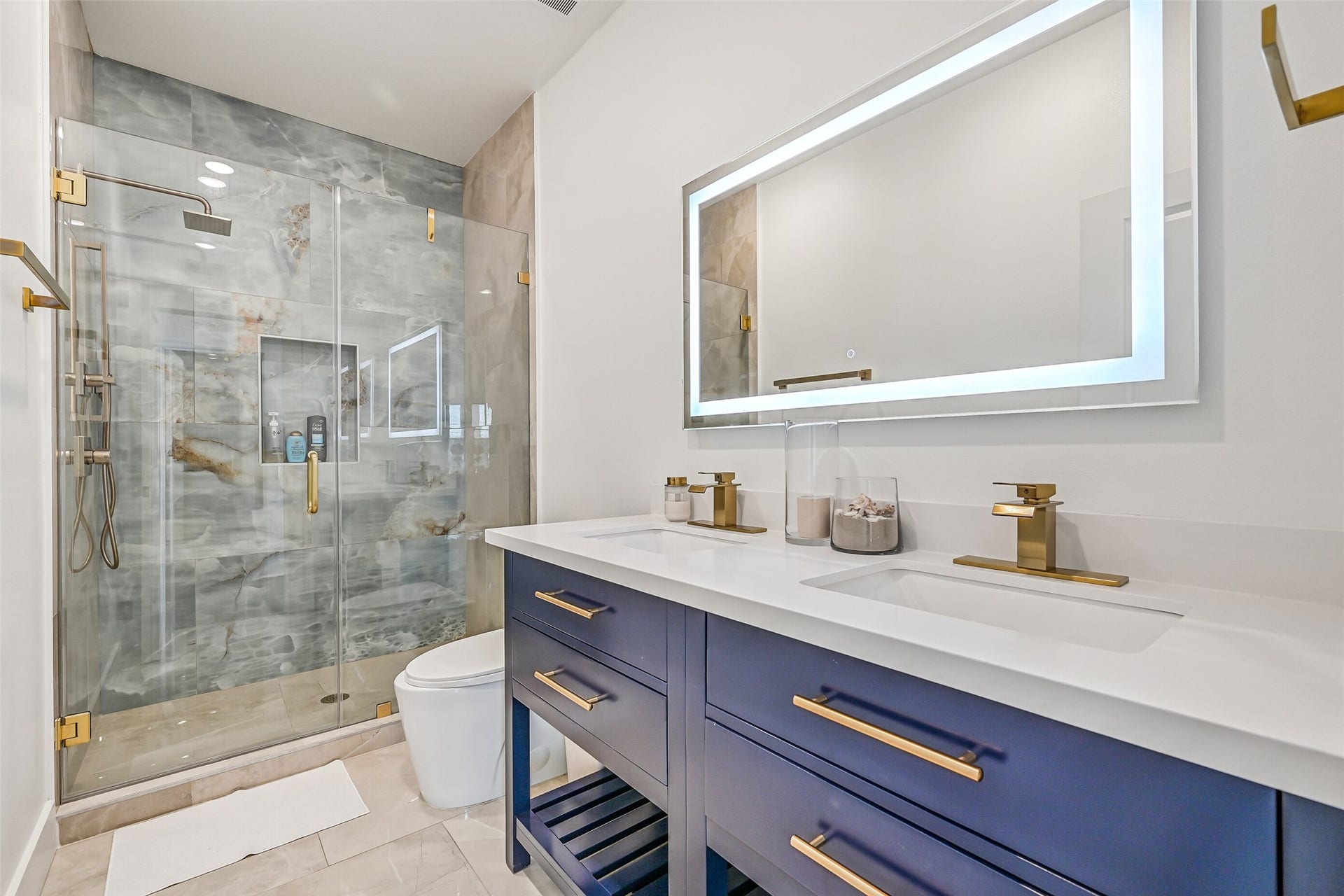 3627 Niko Court, Galveston, TX 77554 Down the hall, youll find two bathrooms, each thoughtfully located next to a bedroom for easy access.