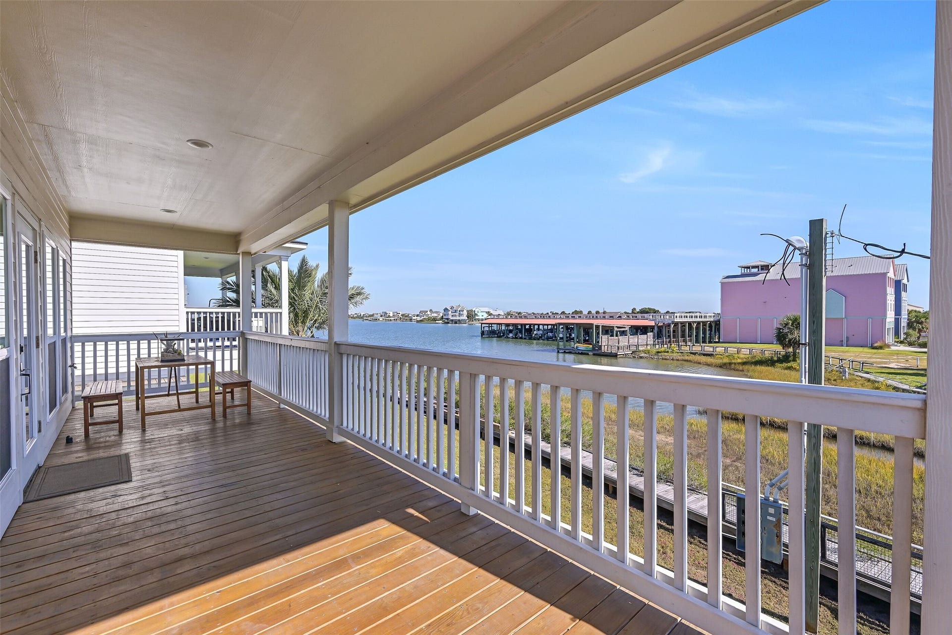 3627 Niko Court, Galveston, TX 77554 As you make your way upstairs, youll be welcomed onto the east-facing covered deck.