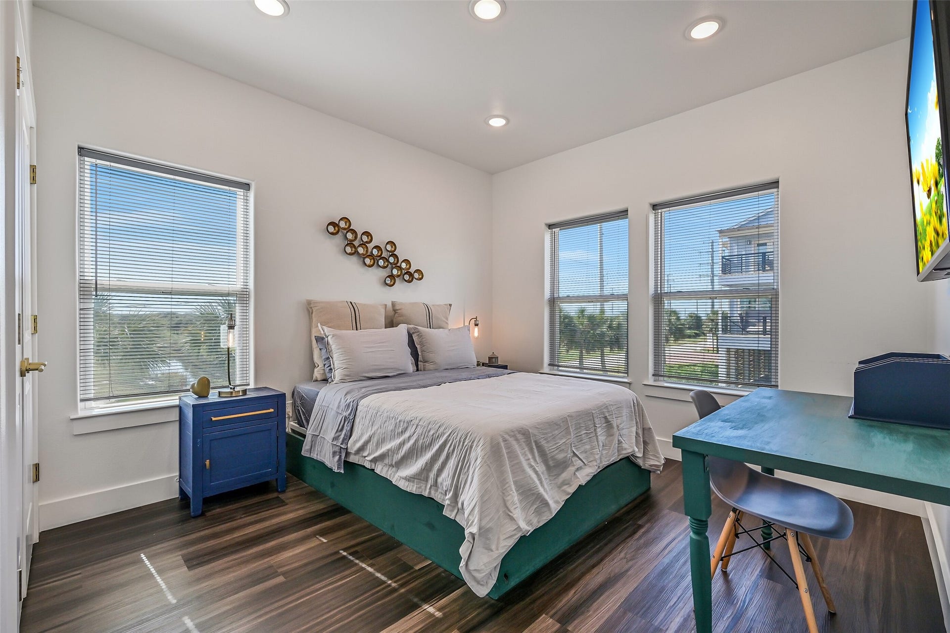 3627 Niko Court, Galveston, TX 77554 Across the hall from the guest bedroom, youll find the spacious primary retreat.