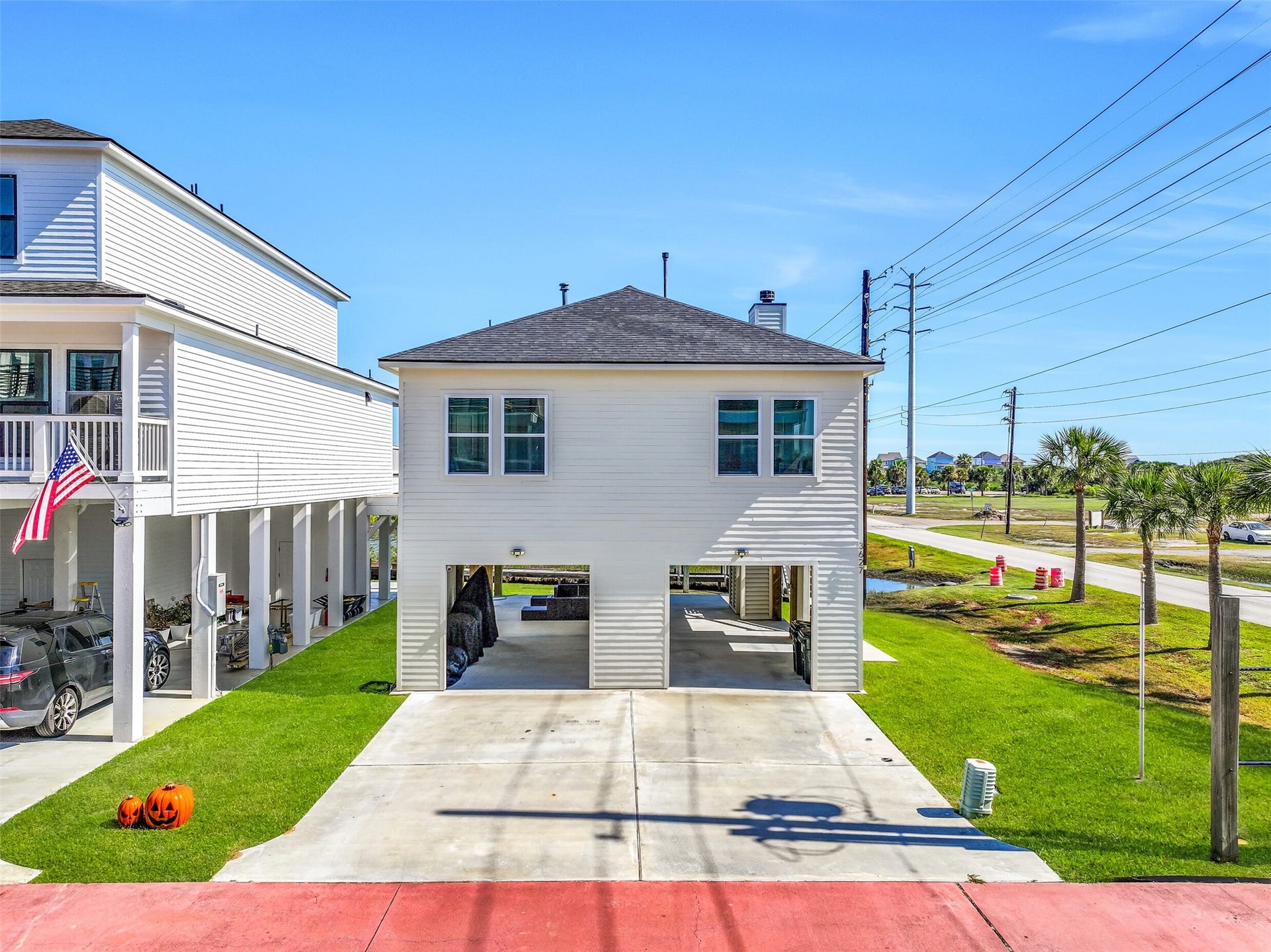 3627 Niko Court, Galveston, TX 77554 This home boasts a double-wide driveway, additional entertaining space, beautiful Lake Como views, and NO HOA!