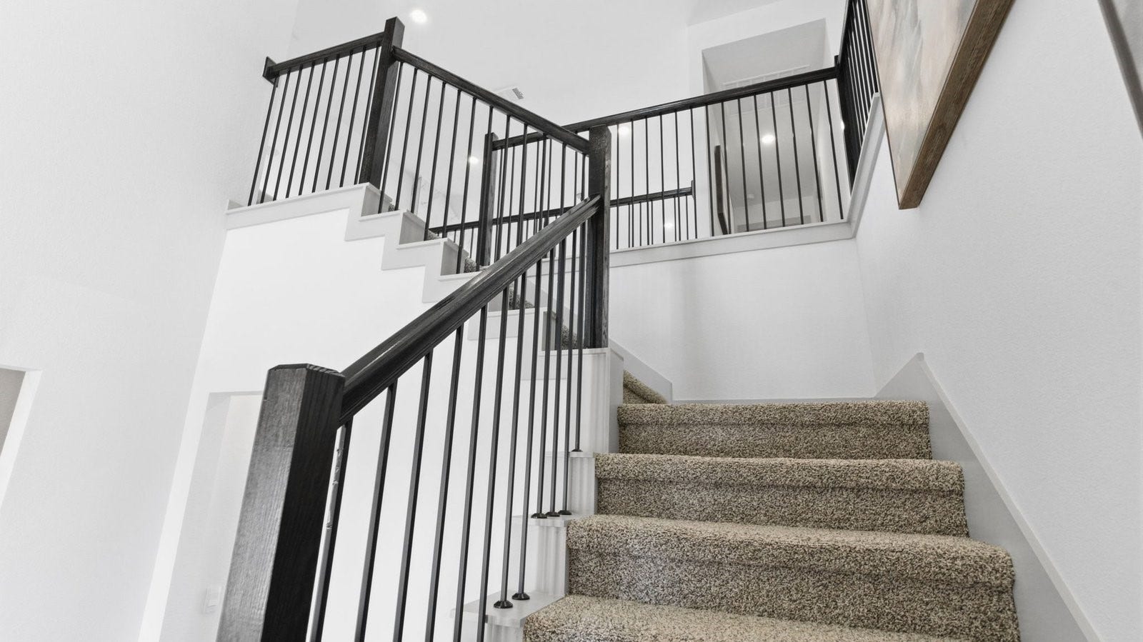 2507 Friendswood Trail, Friendswood, TX 77546 A grand staircase leading to the second floor with a luminating chandelier