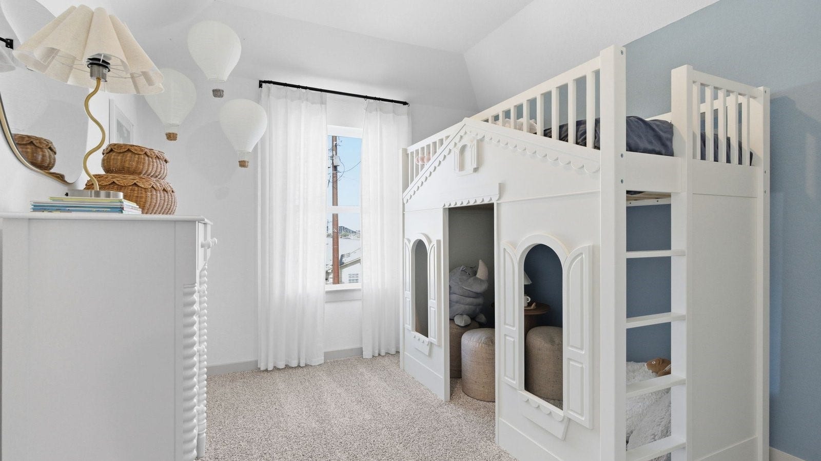 2507 Friendswood Trail, Friendswood, TX 77546 A vibrant bedroom showcasing a neatly made bed, a stylish dresser, and a playful painting that adds charm.