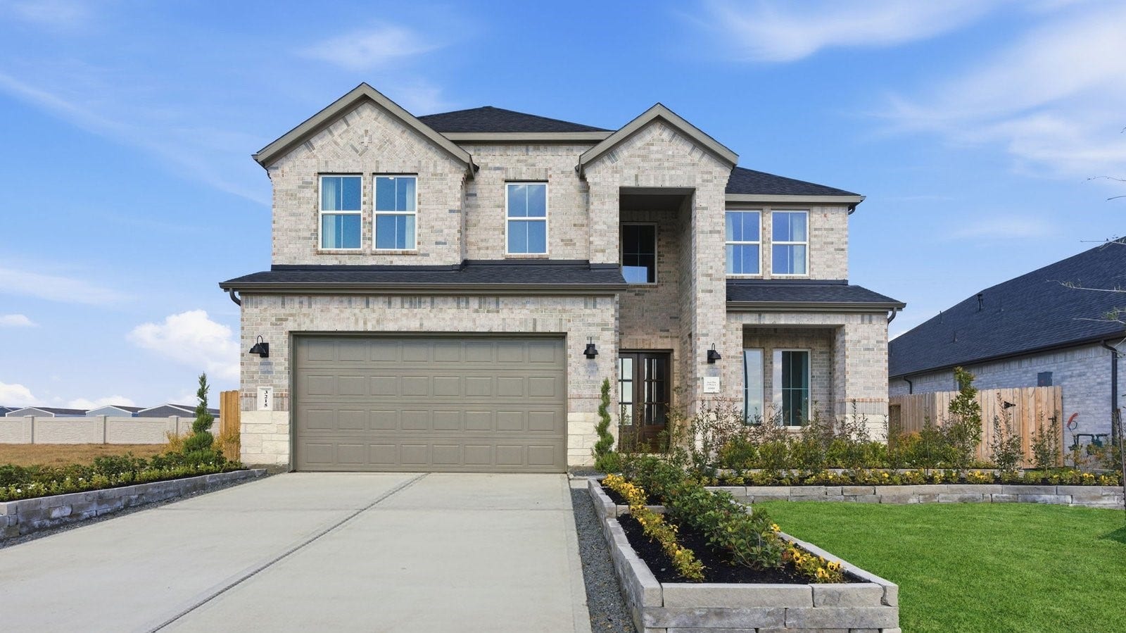 2507 Friendswood Trail, Friendswood, TX 77546 A beautiful spacious two story home with modern interior architecture, a covered patio, four bedrooms, three and a half bathrooms and a three car garage