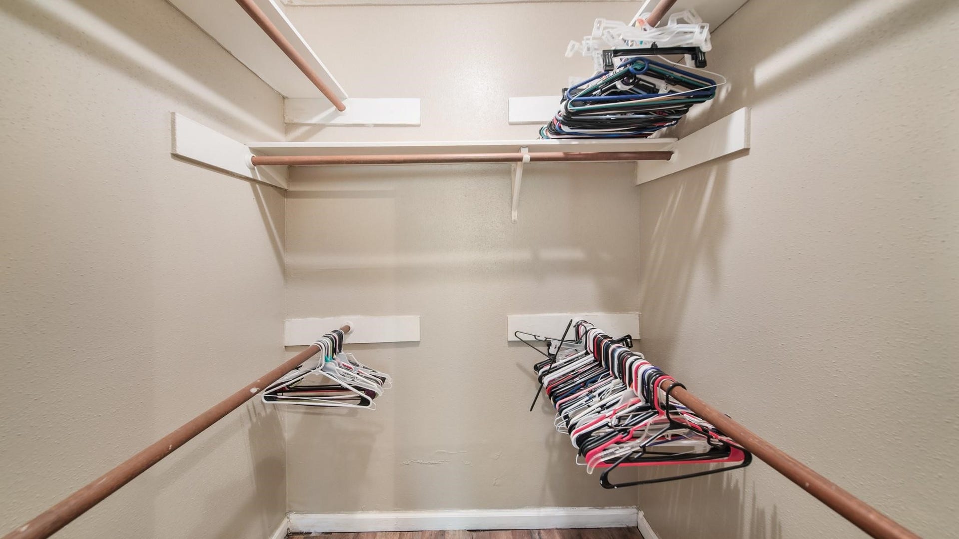 2012 Sandy Knoll Drive, Missouri City, TX 77489 Primary bedroom walk-in closet with ample hanging and storage space.