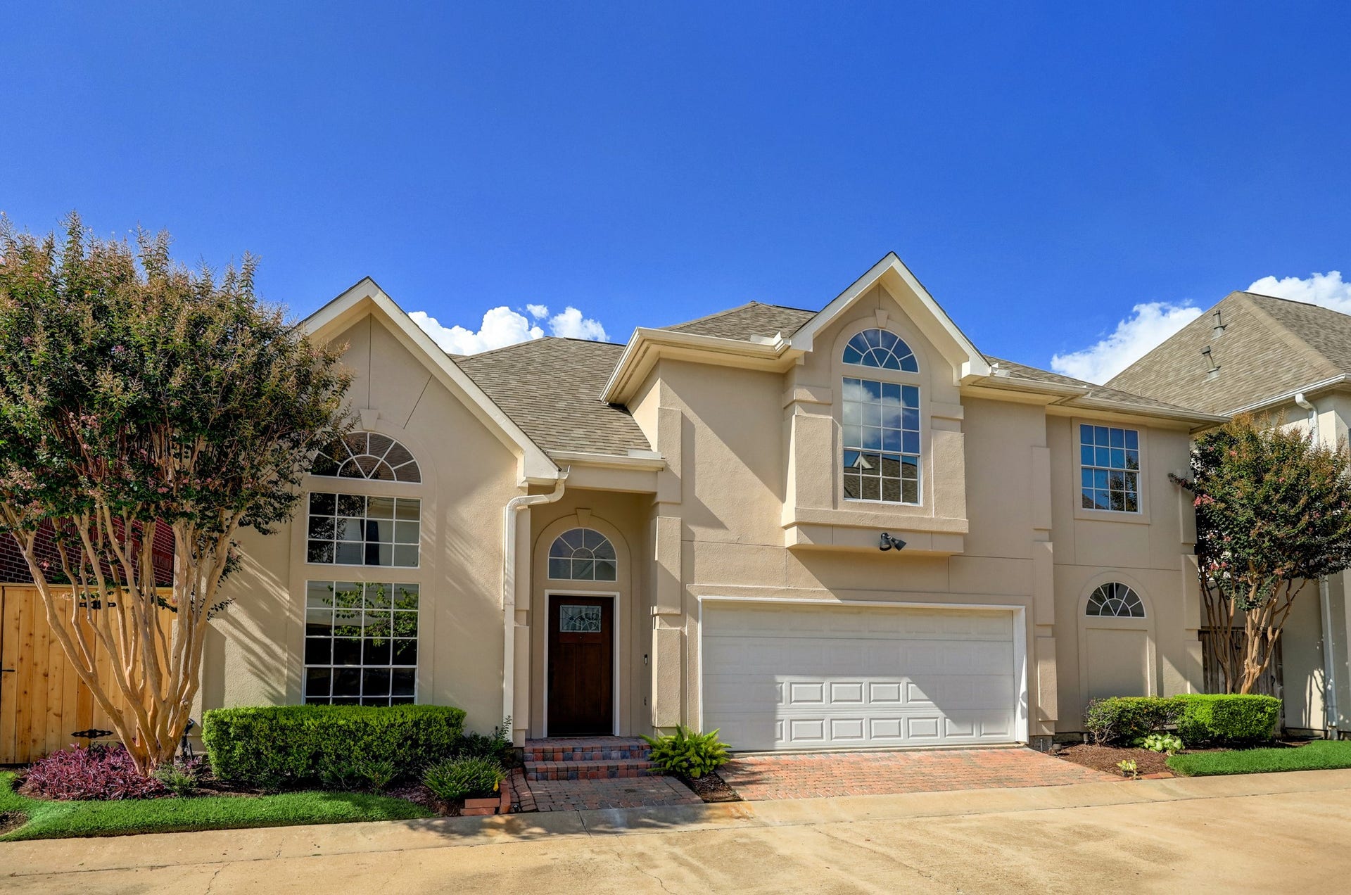 3608 Timberside Circle Drive, Houston, TX 77025 WELCOME TO 3608 TIMBERSIDE CIRCLE: Nestled in a quiet gated community just south of Braeswood and West University, this elegant home features arched windows, lush landscaping, and a spacious two-car garage. A perfect blend of classic charm and modern comfort.