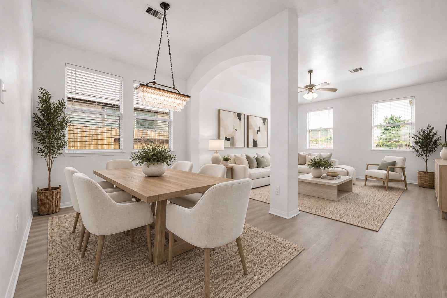 4707 Waukegan Road, Conroe, TX 77306 Nearby windows bring natural light into the dining area, while the adjacent living area keeps the