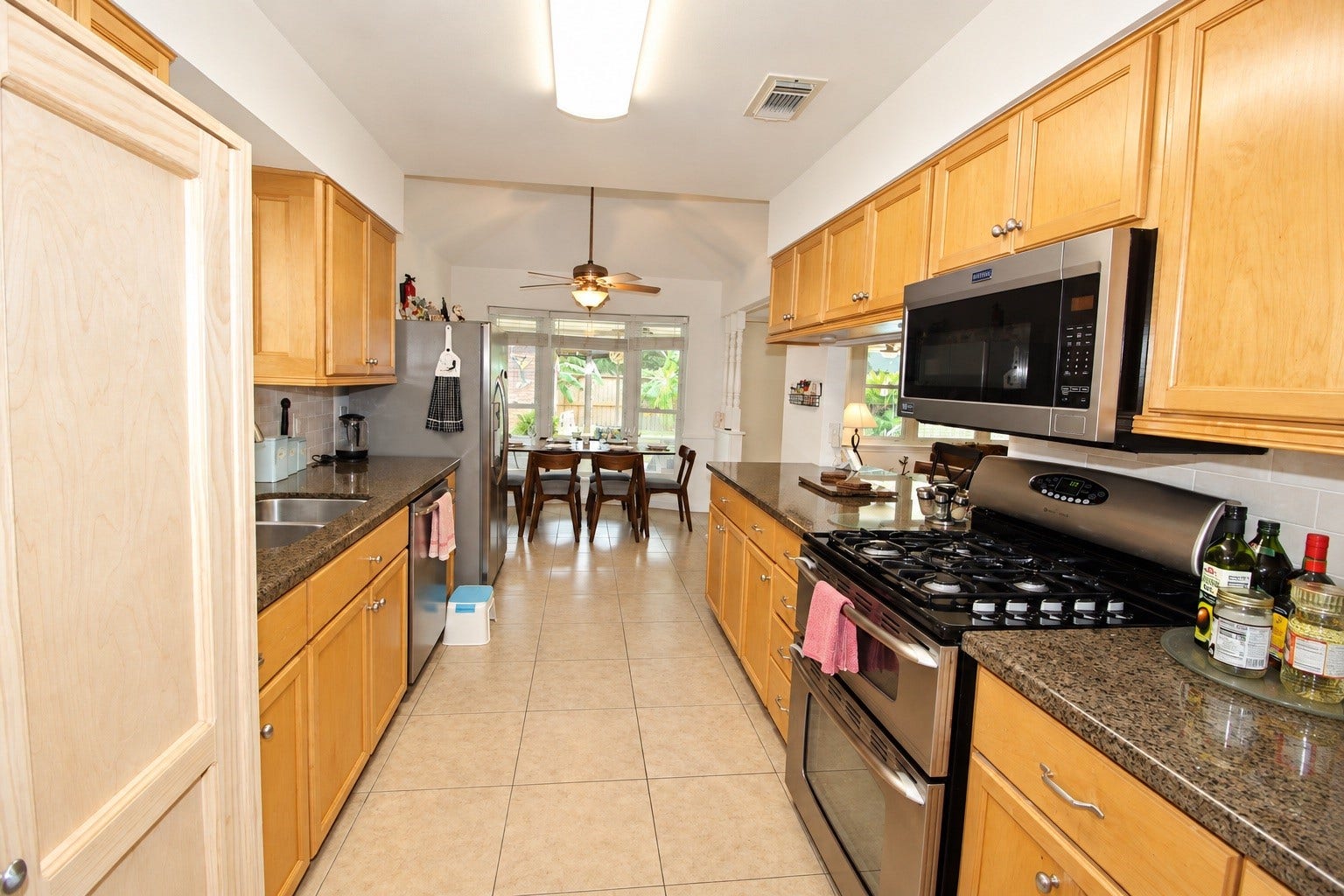 13767 Greywood Drive, Sugar Land, TX 77498 Alternate view of the kitchen featuring all stainless steel appliances