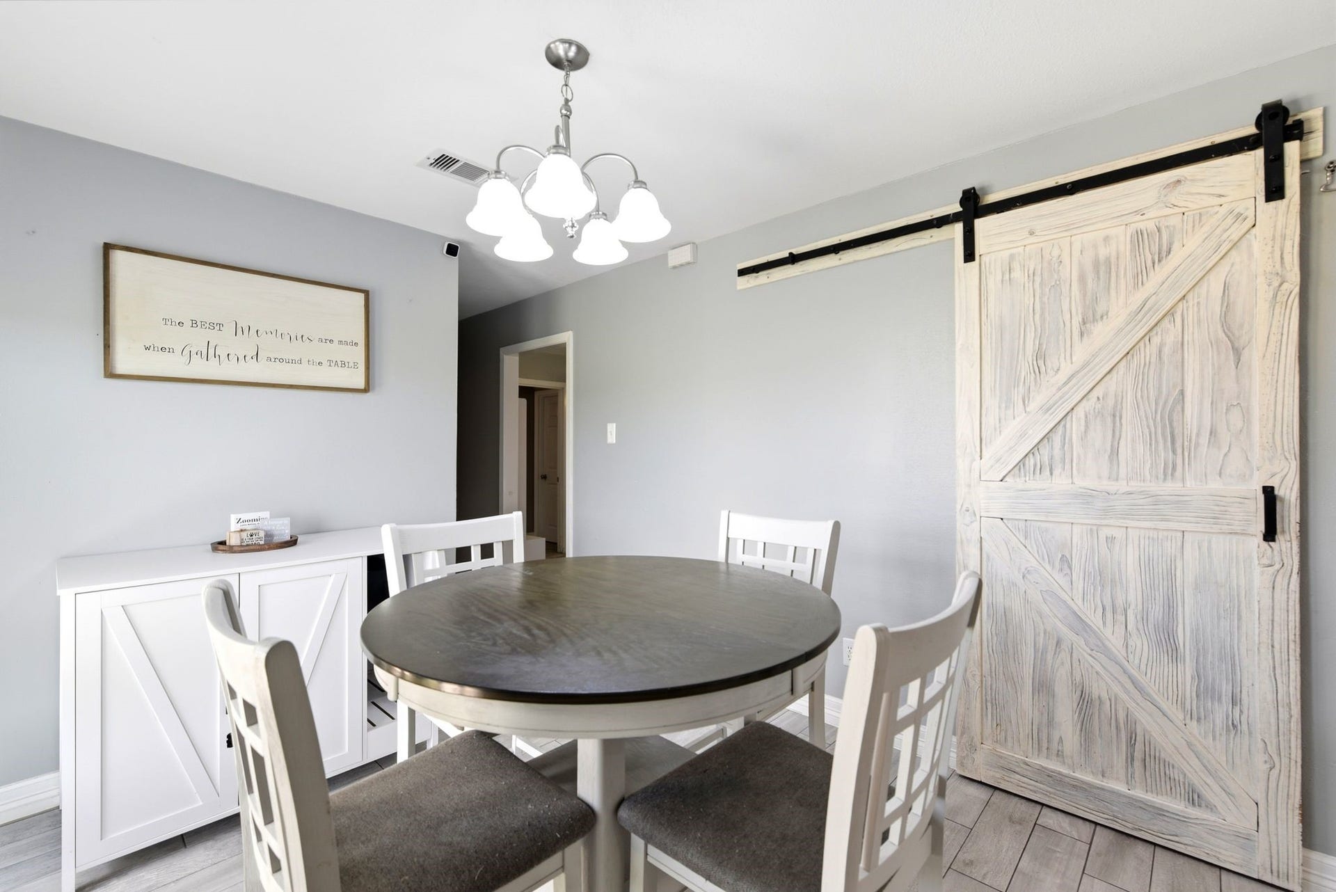 2405 Hillshire Drive, Deer Park, TX 77536 Rustic barn door in the dining area.