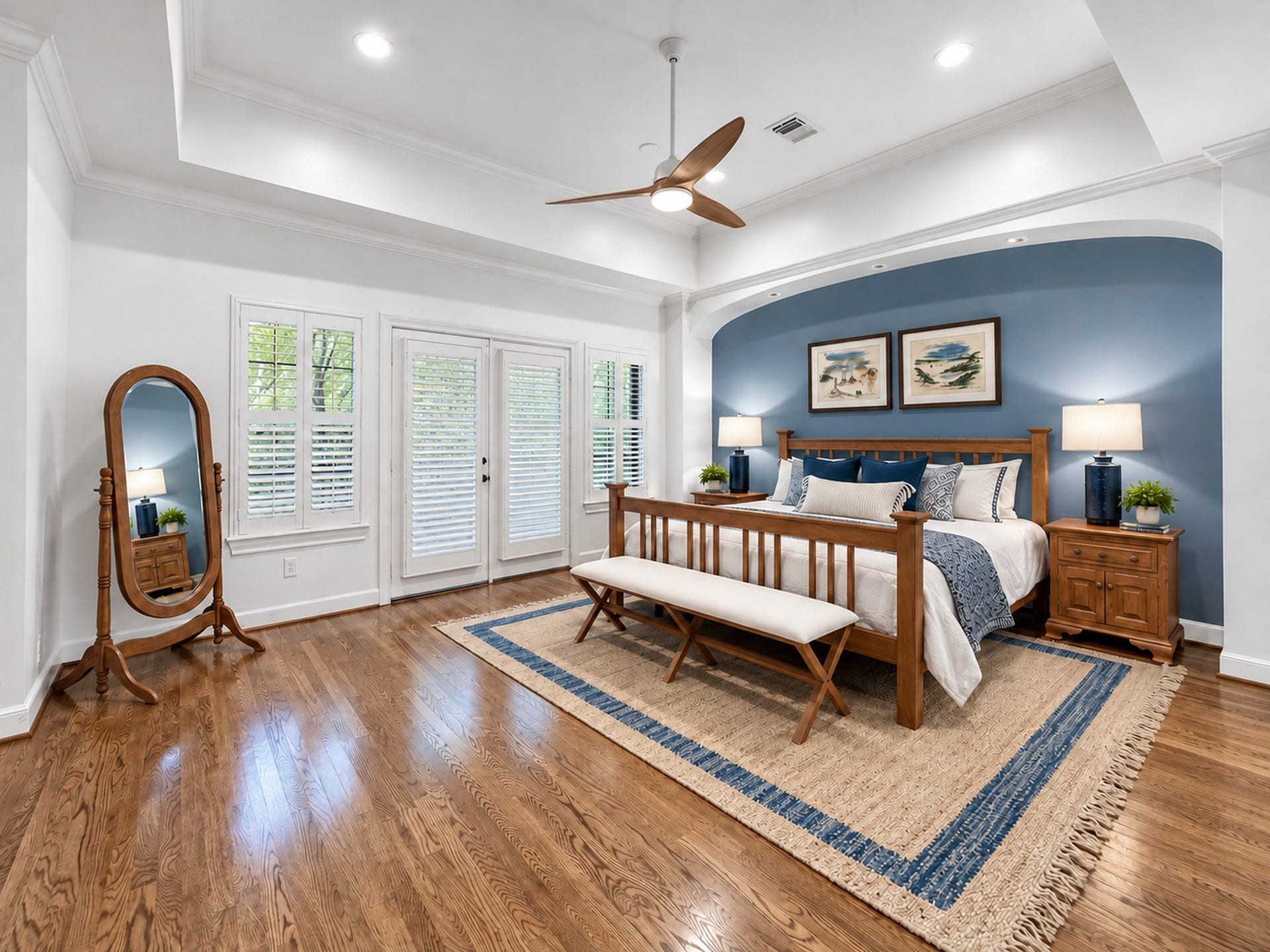 54 Riva Row, The Woodlands, TX 77380 Exquisite and spacious primary bedroom. French doors lead to your own private balcony.