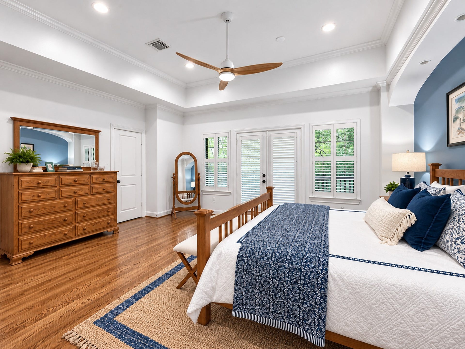 54 Riva Row, The Woodlands, TX 77380 Primary Bedroom features a modern fan and natural LED lighting