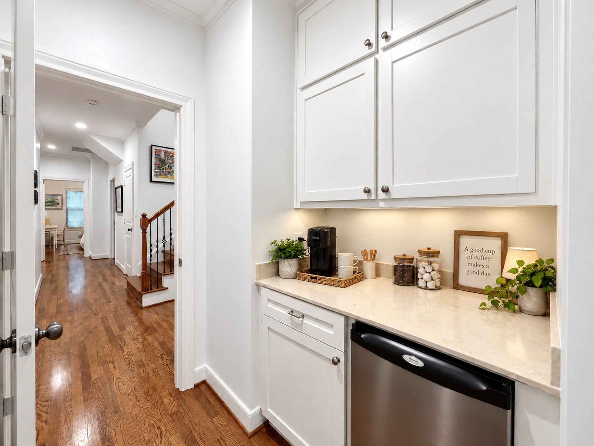 54 Riva Row, The Woodlands, TX 77380 The Primary Bedroom features a convenient coffee bar & mini fridge perfect for early risers.