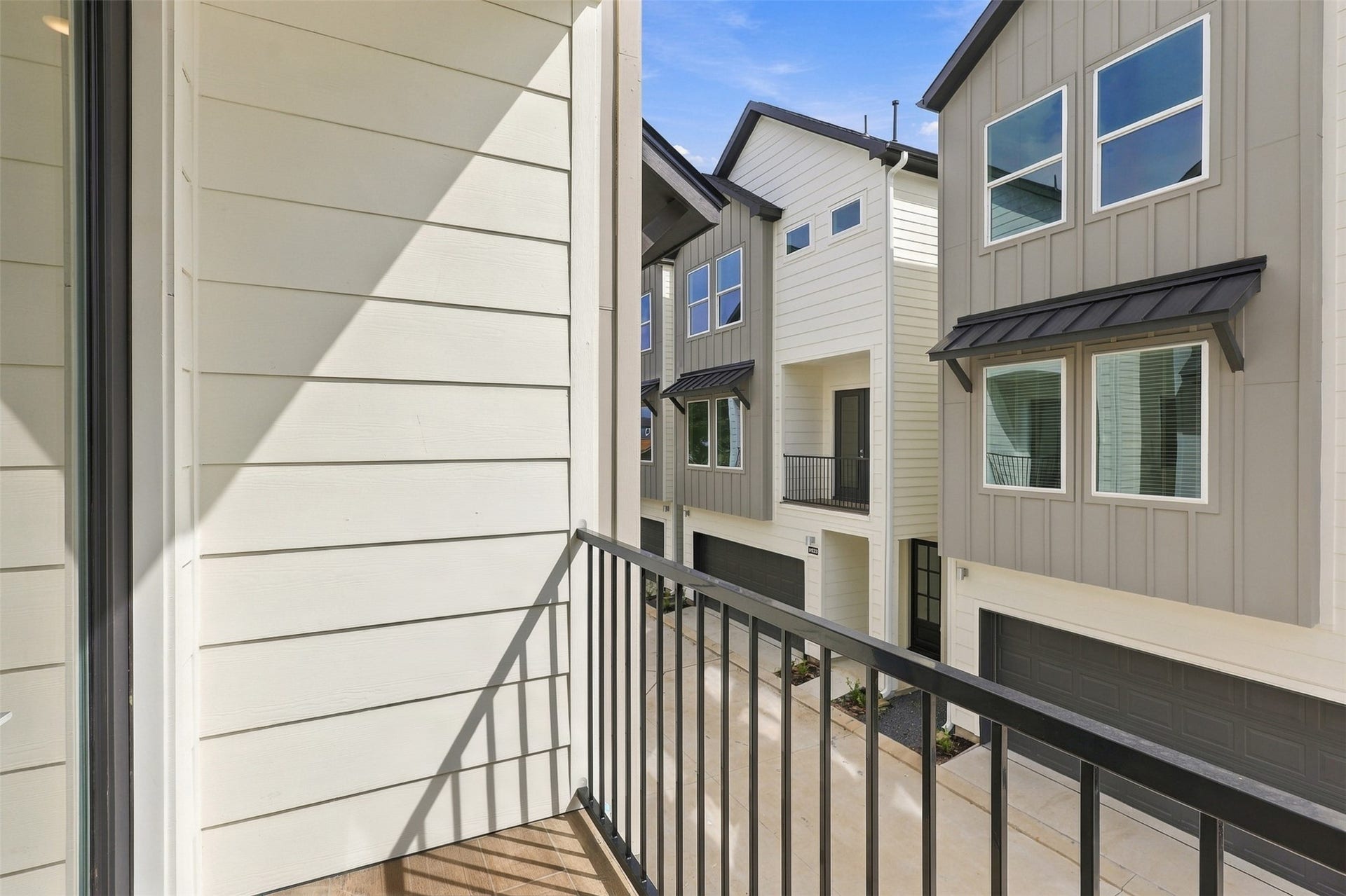 904 Kern Street, #C, Houston, TX 77009 The covered balcony offers a place to step out from the living area.