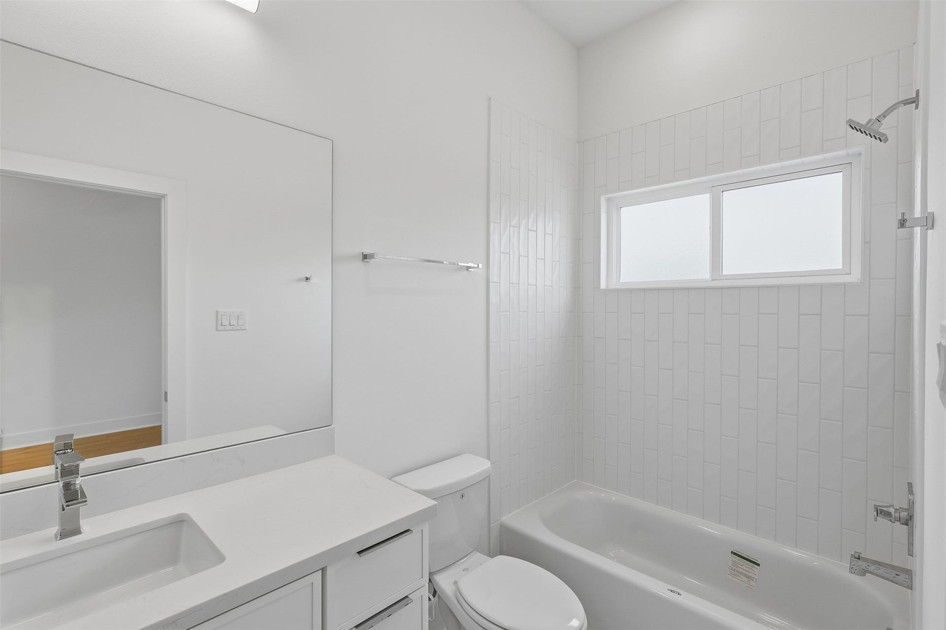 904 Kern Street, #C, Houston, TX 77009 The laundry space includes appliance connections and shelving.