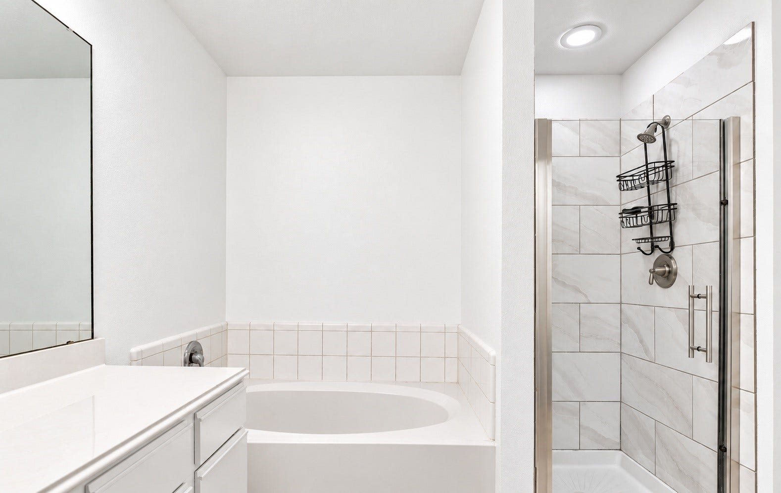 16111 Wisteria Hill Street, Houston, TX 77073 Has a walk in shower AND a soaking tub!