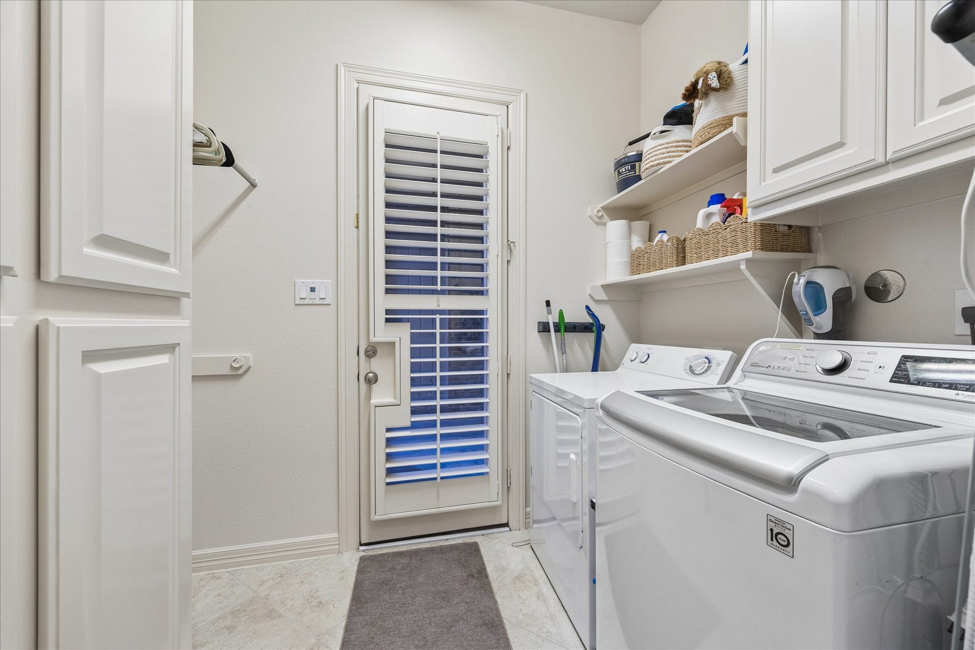 The laundry room has an exterior entry from the breezeway.