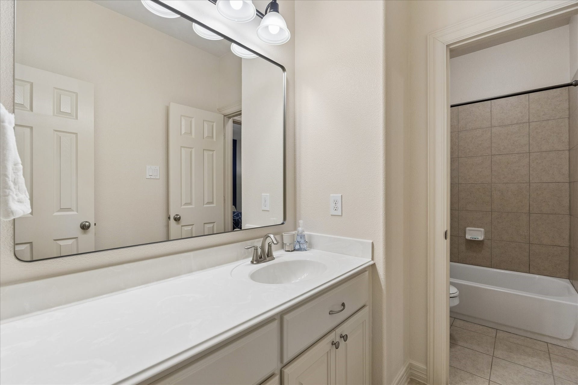 A second full bath sits near the game room